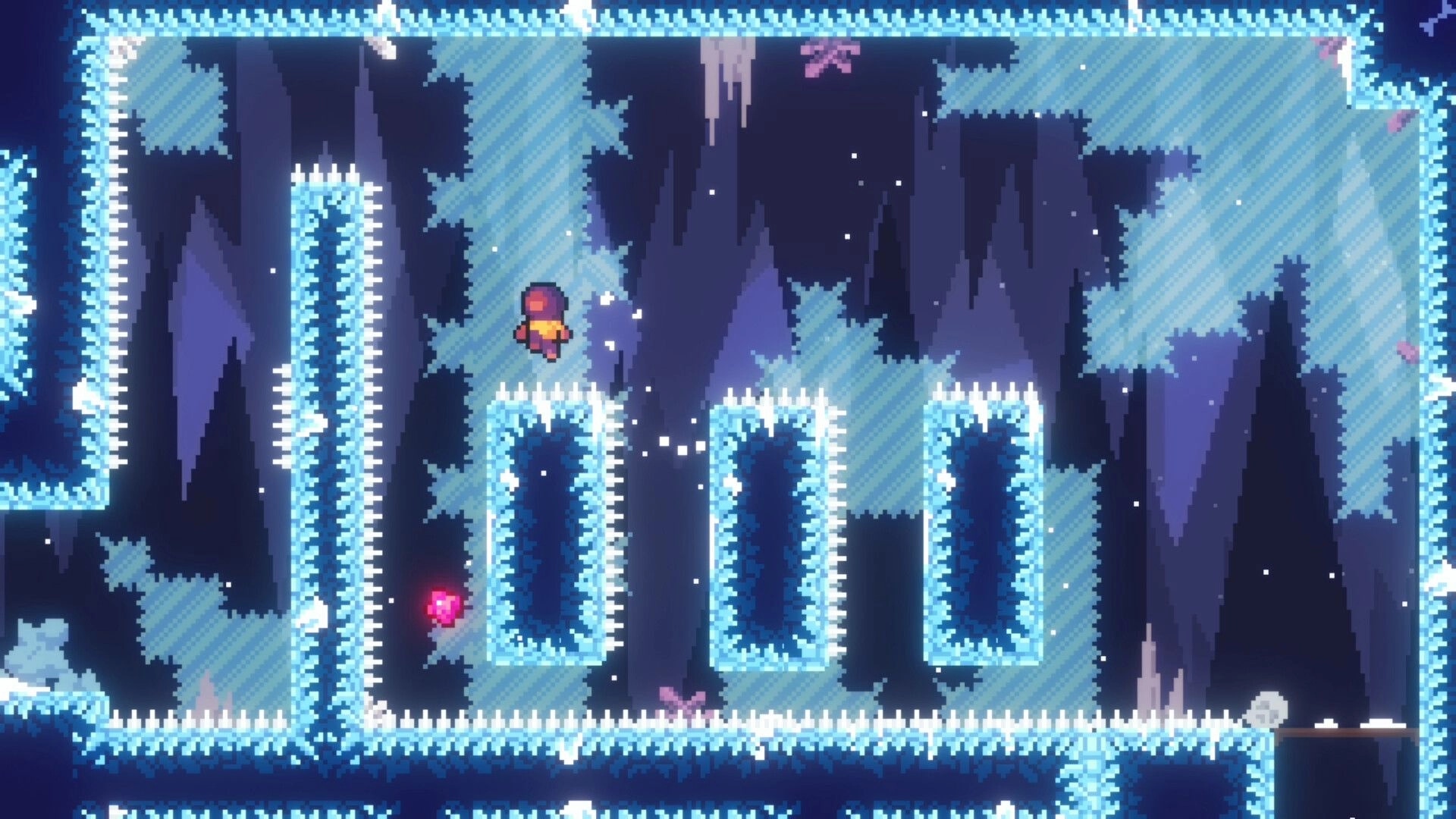Cryorise: Heroine mid-jump past icy spikes and narrow ledges in a frosty cave platforming room.