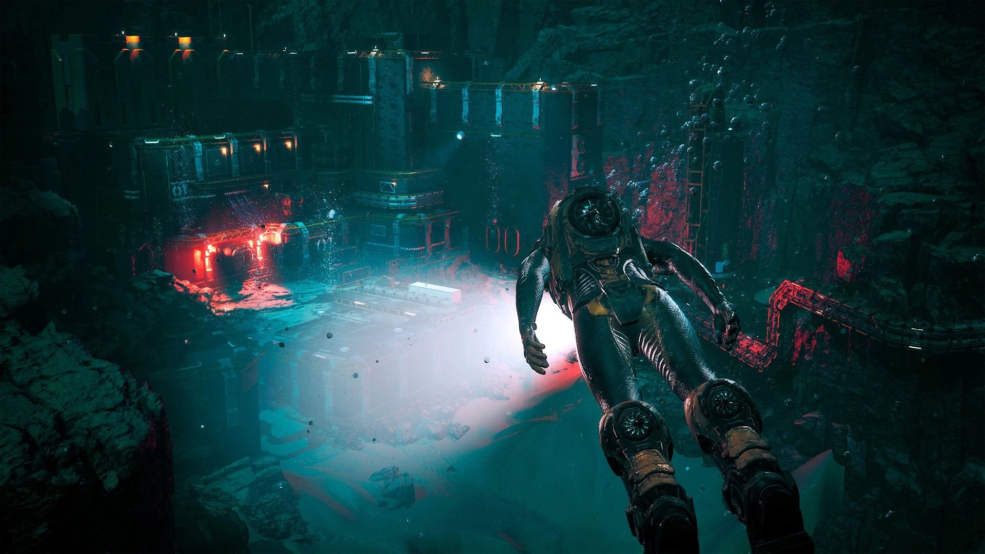 Cthulhu: Diver in bulky suit swims toward red-lit underwater station ruins in a dark abyss cavern.