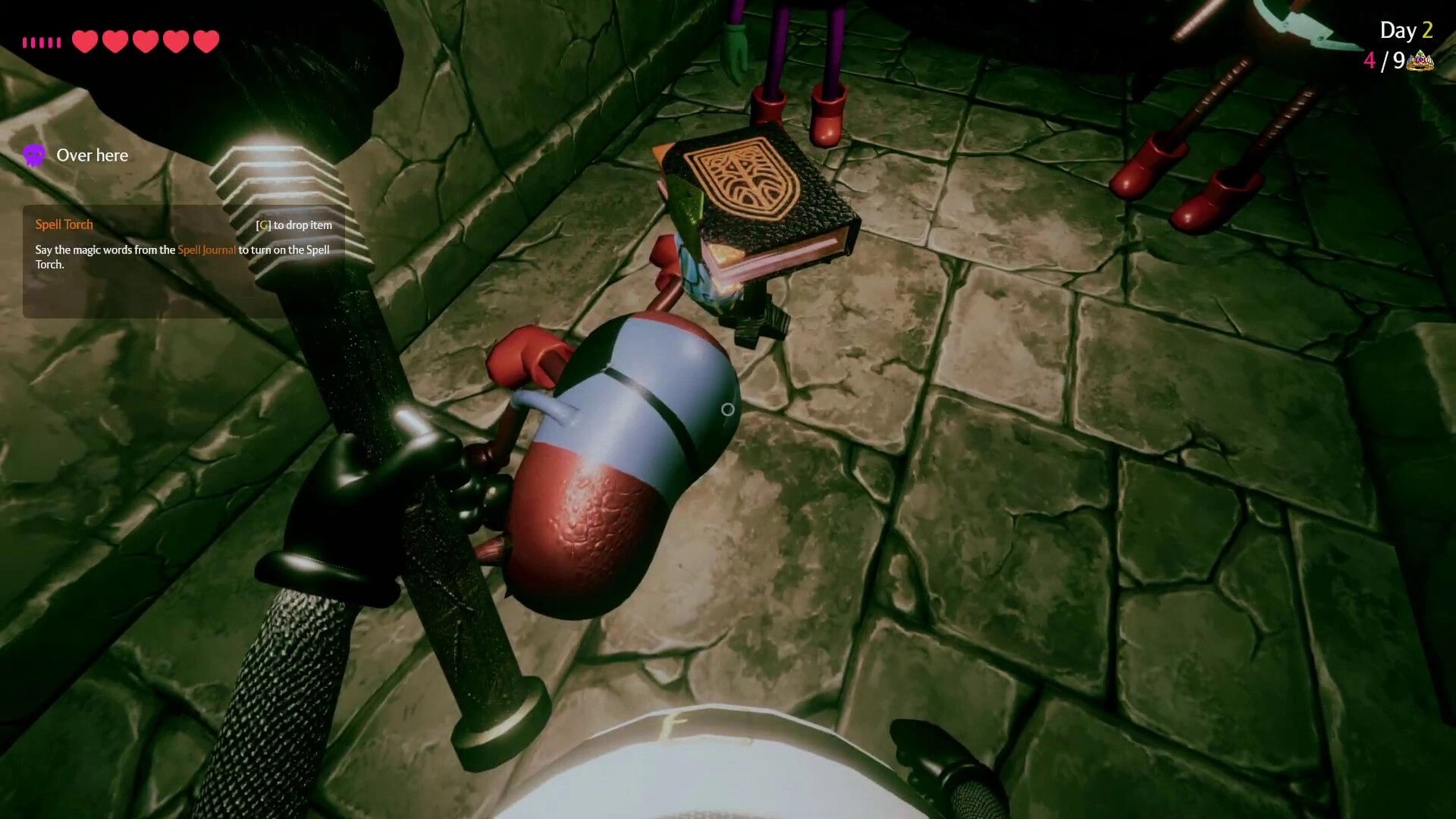 Cursed Companions: Player holding glowing spell torch in dungeon with spell journal on stone floor