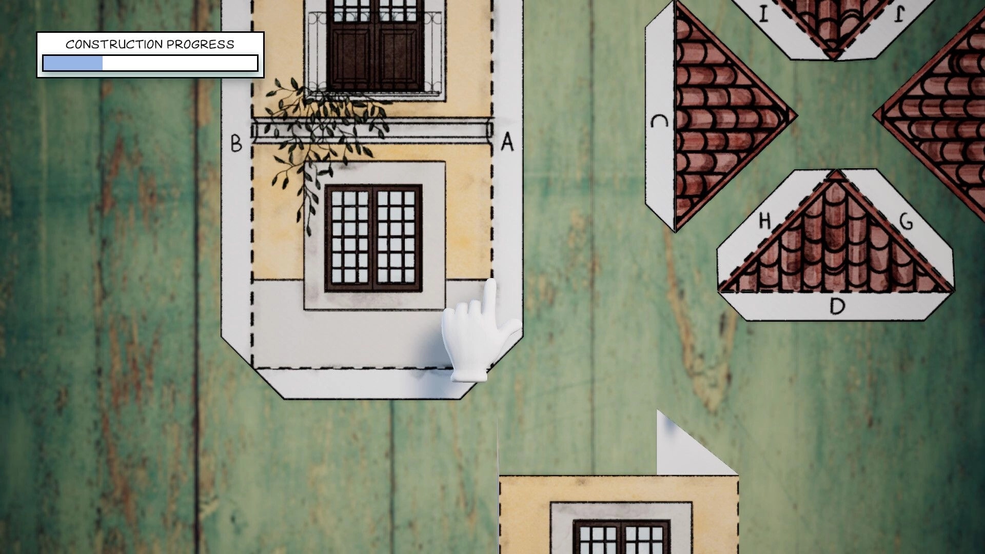 Cutout Village: Hand cursor folds paper house wall as construction progress bar fills on wooden tabletop.