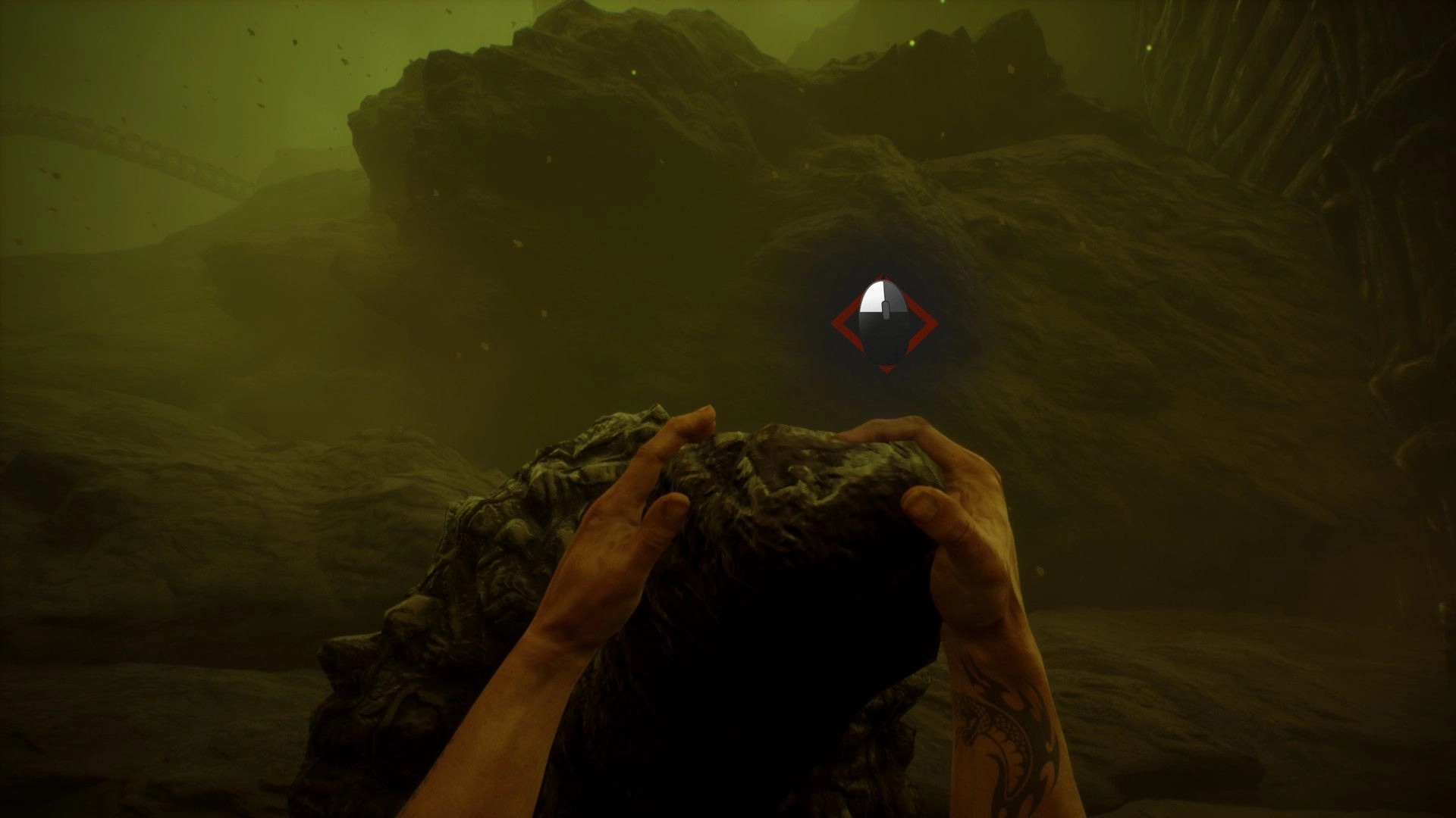 Dark Fracture: Player grips rock in eerie cave environment with mouse interaction icon visible