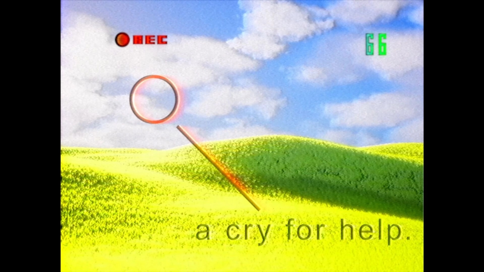 Dead Format: Recording icon, green field, text "a cry for help" under sunny sky with clouds