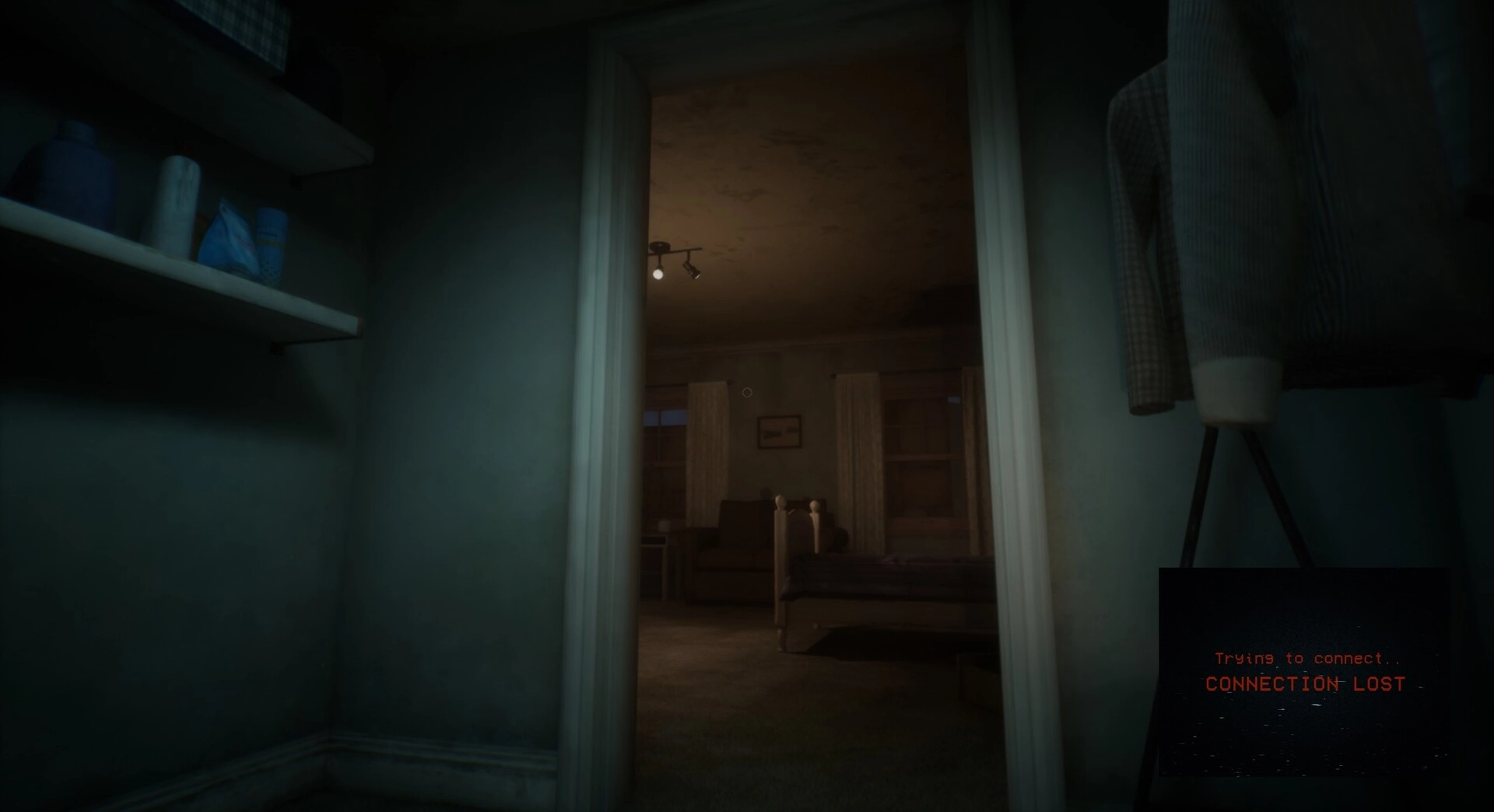 Deadcam: Dimly lit hallway with doorway to bedroom; connection lost message on screen corner