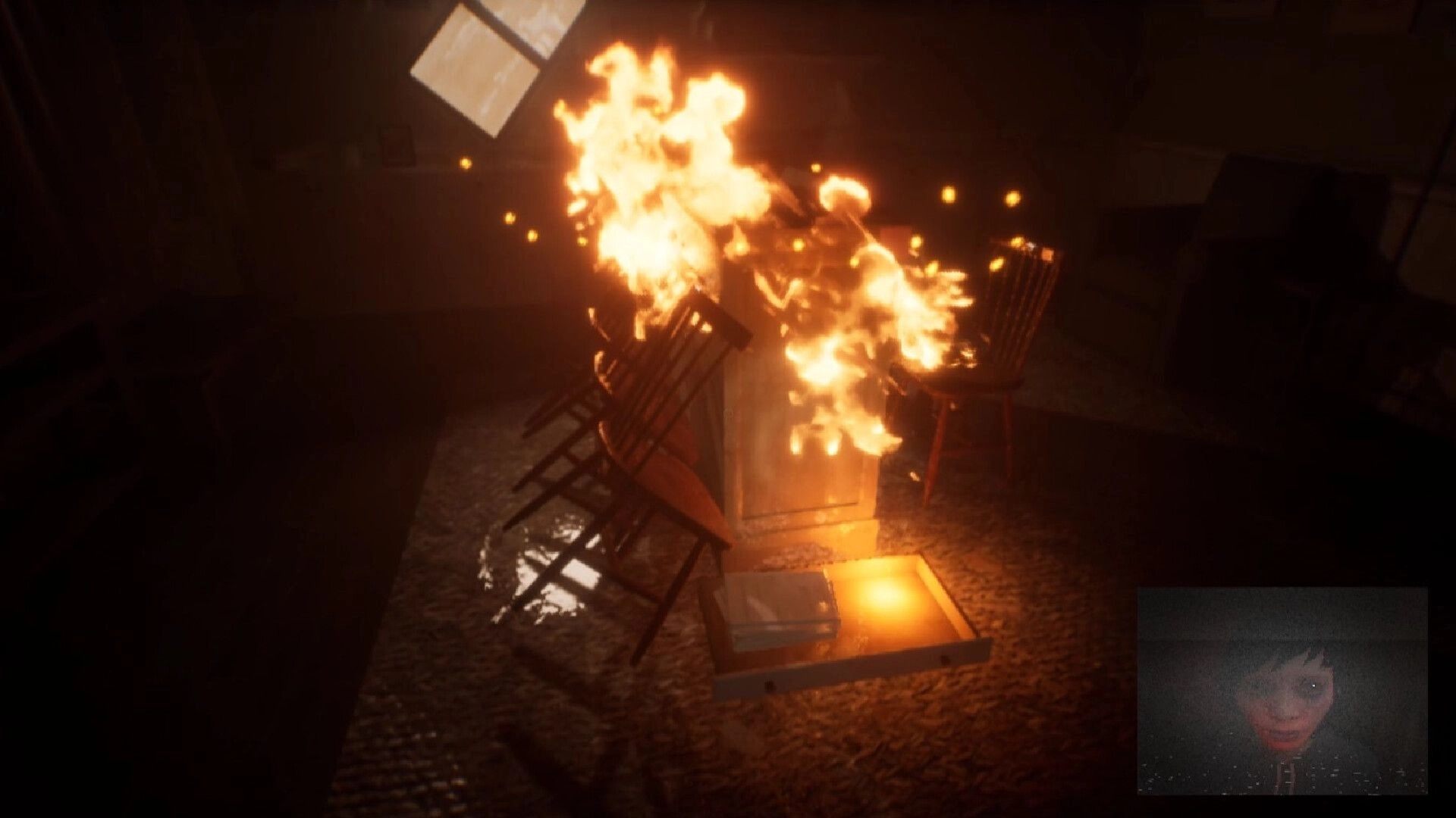 Deadcam: Living room ablaze with chairs on fire, inset shows Margo's eerie face on headcam display