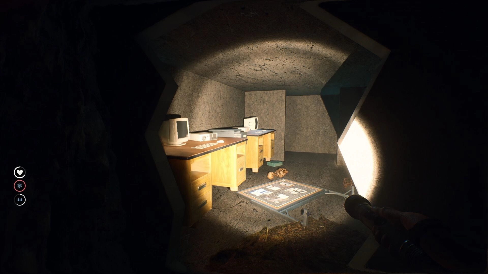 Deadhikers: Exploring dimly lit underground room with computers and a skeleton, flashlight in hand