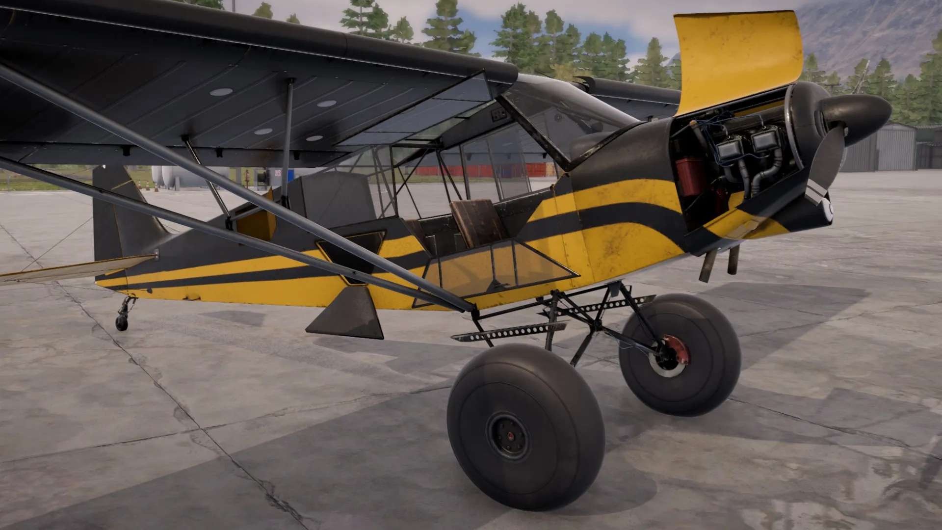 Deadstick: Detailed view of a yellow bush plane on the airstrip with engine exposed and forest background