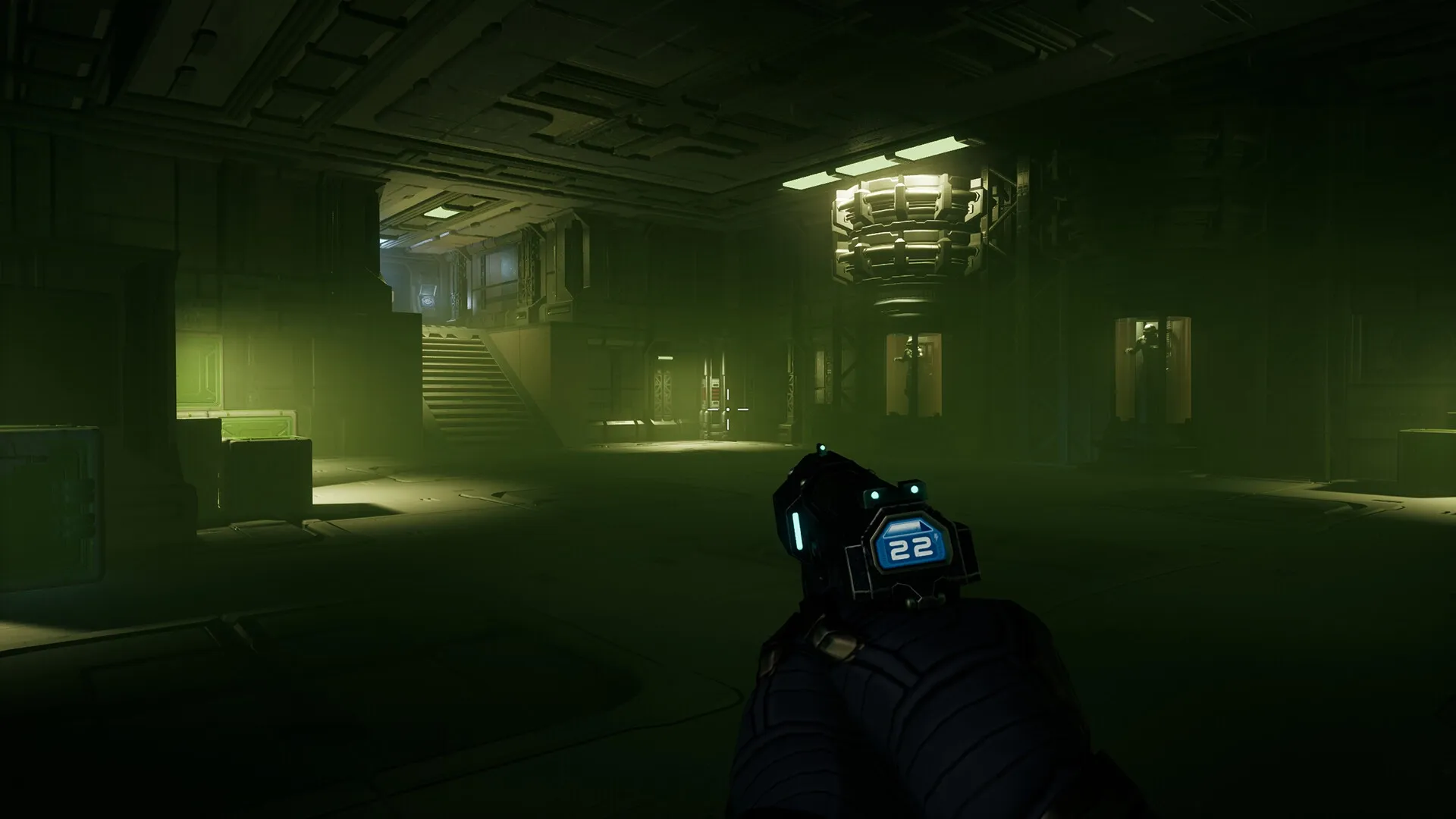 Deadzone: First-person perspective with a gun, exploring a dimly lit industrial space station corridor.