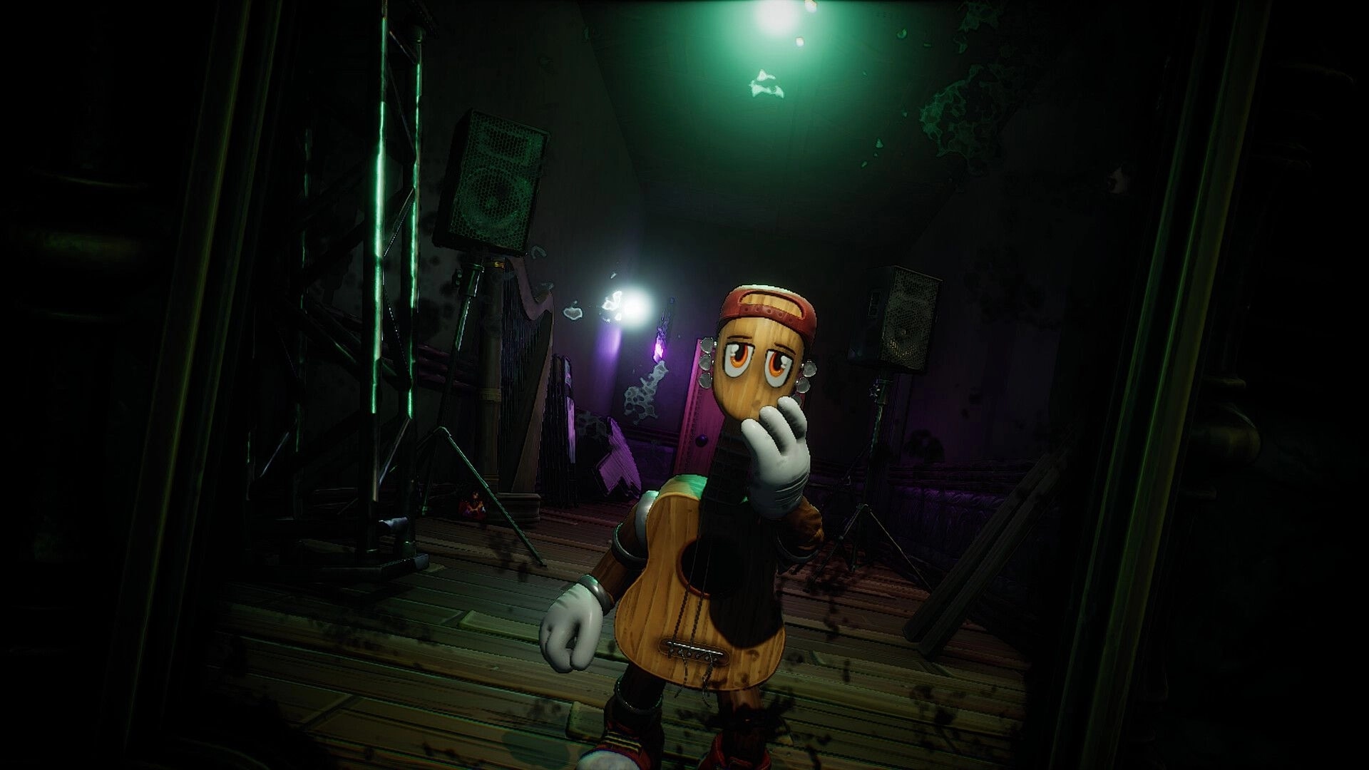 Don’t Fret: Sentient guitar character in gloves holds its neck in a dark stage room with speakers.