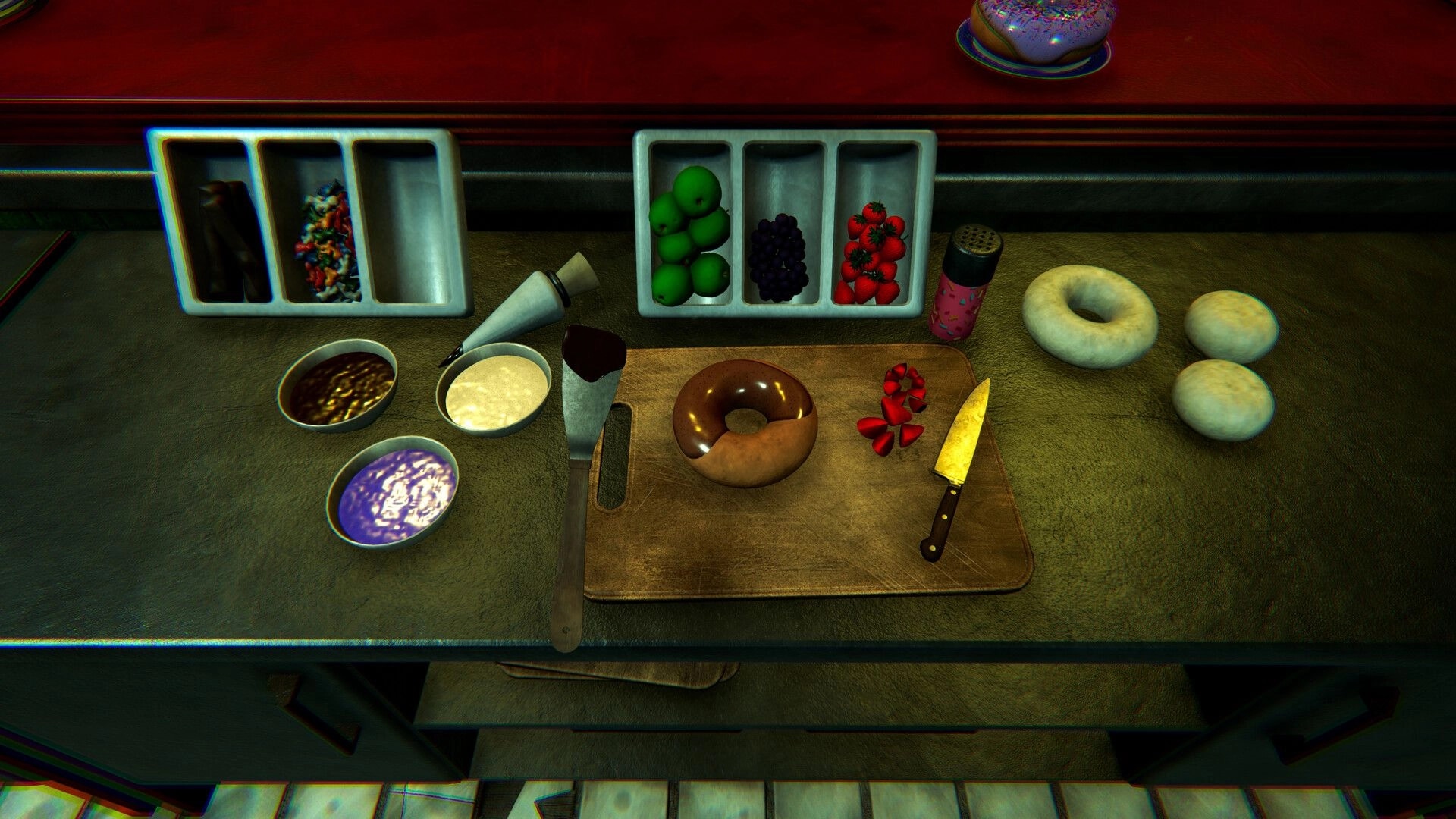 DONUT PANIC: Glazing a donut on a prep counter with bowls of icing, fruit trays, and a knife in kitchen.