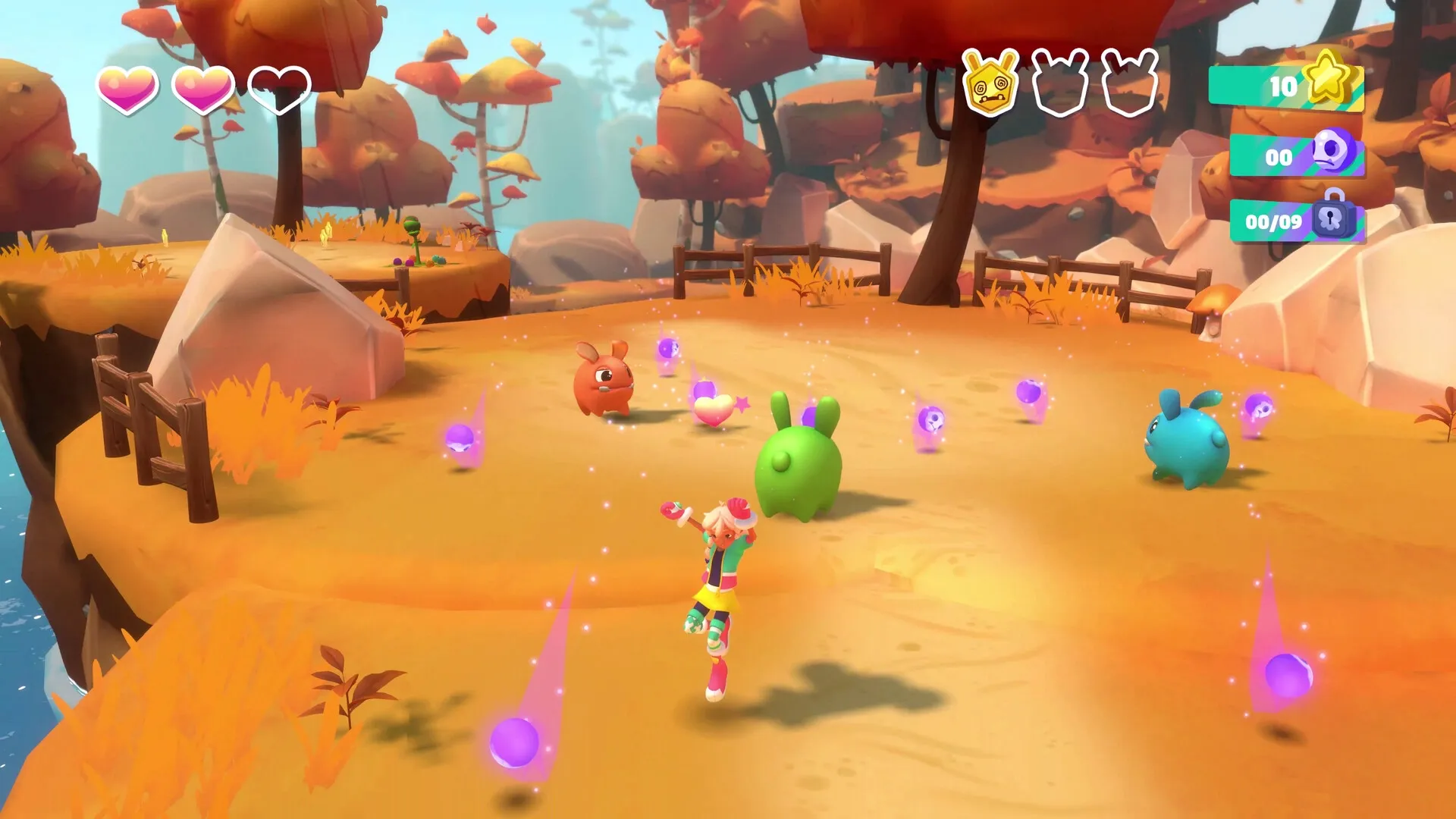 Dracamar: Caliu jumps to collect Moki-balls on a vibrant autumn island with colorful creatures nearby.