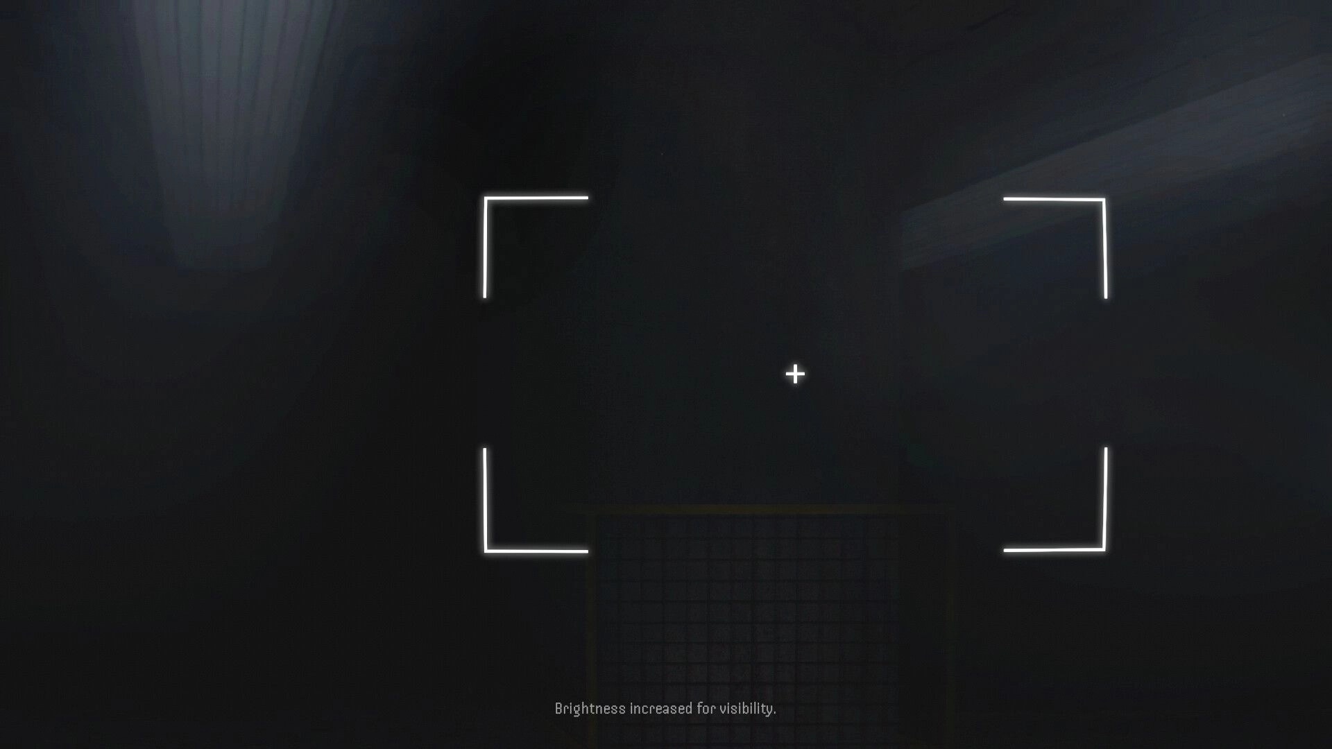 DUMMY HOUSE: Camera viewfinder crosshair aimed into a dark industrial corridor with faint railing below.