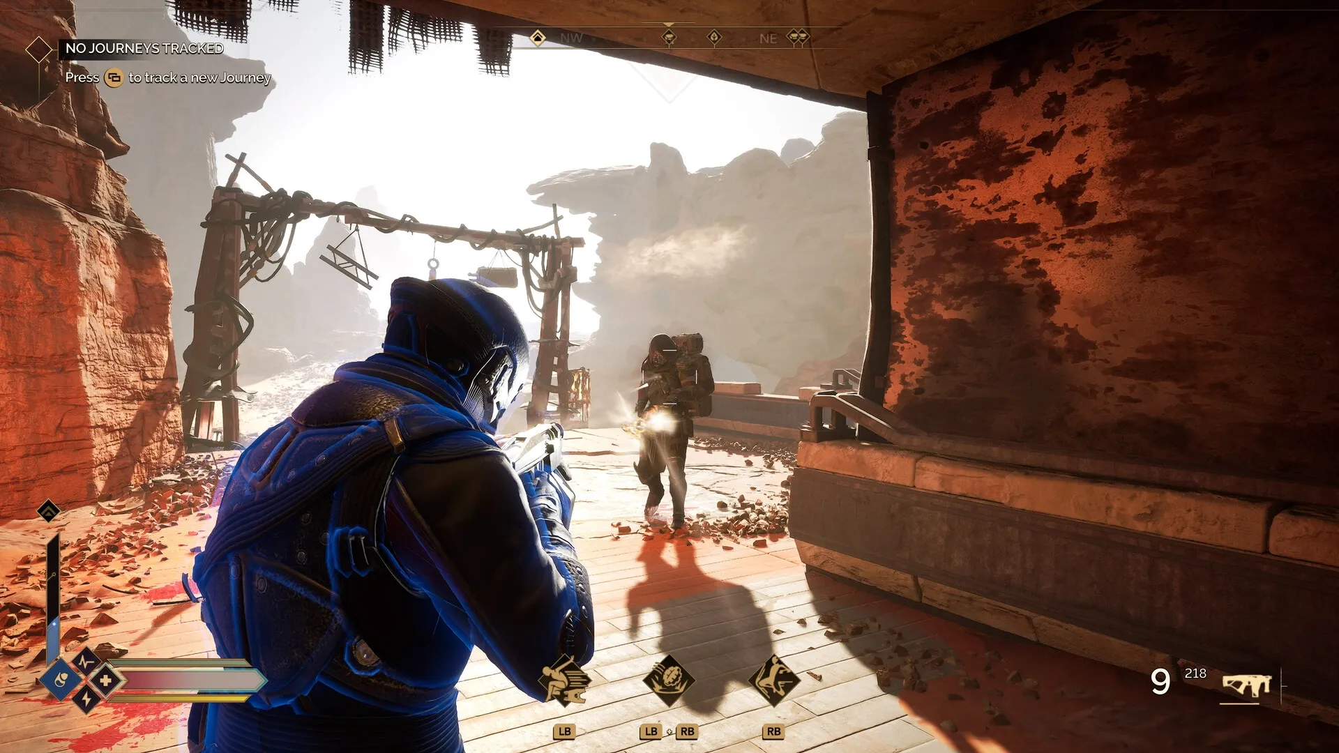 Dune: Player in combat shooting an enemy in a desert canyon with UI elements visible