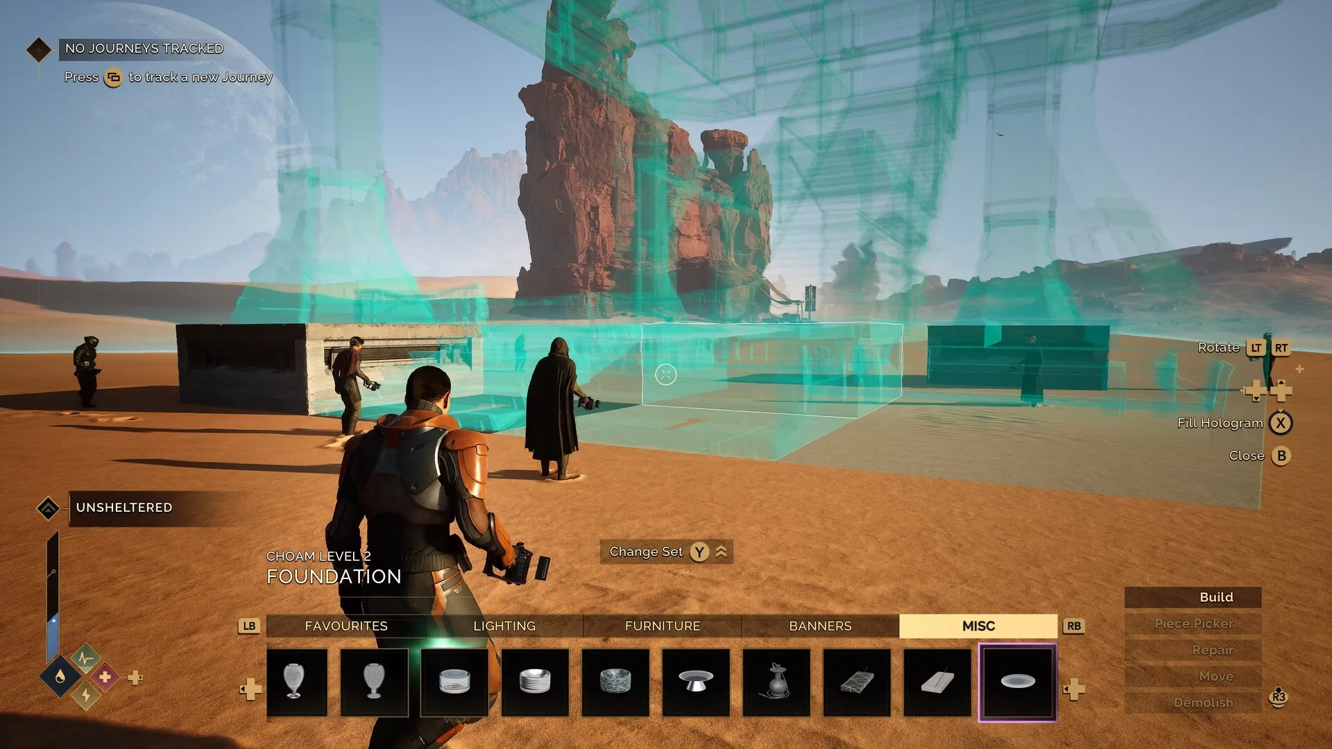 Dune: Players build structures using holographic blueprints in the desert environment of Arrakis.