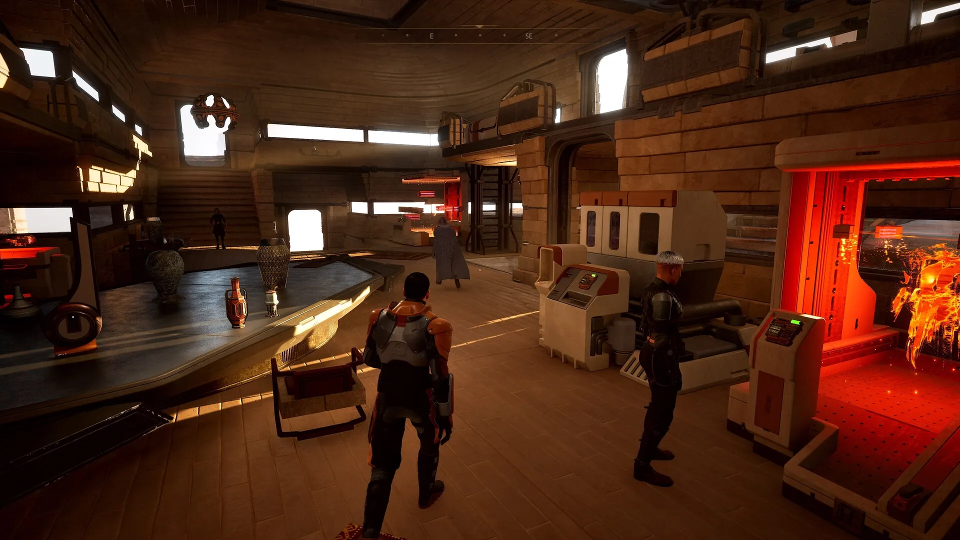 Dune: Characters in a spacious, futuristic interior with holographic displays and intricate decor on Arrakis