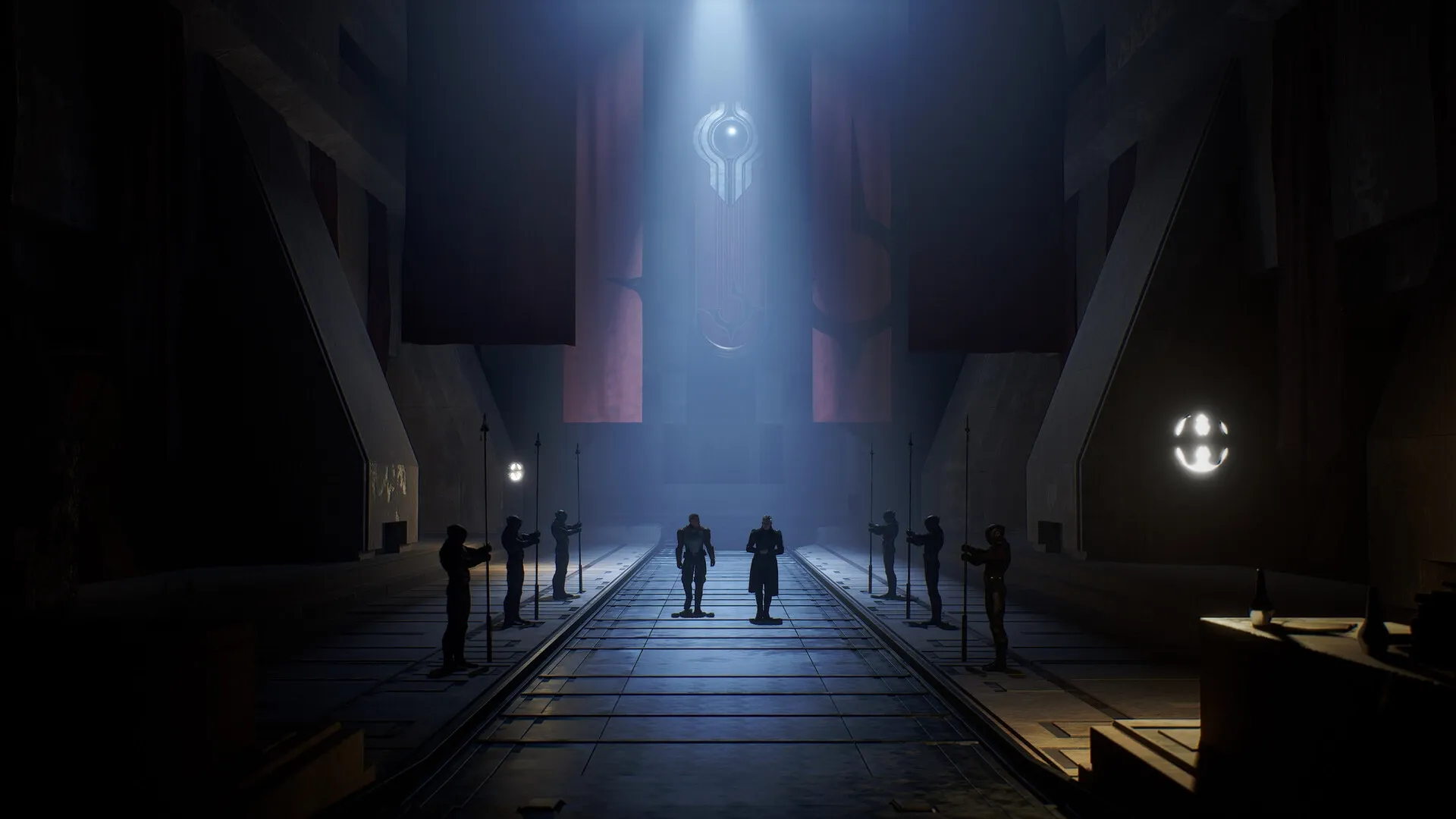 Dune: Two figures walk down a grand hall with guards in a dimly lit, futuristic fortress interior