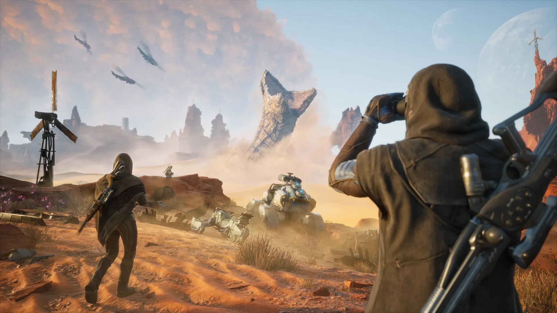 Dune: Characters observe massive sandworm emergence in desert landscape with vehicles and wind turbines