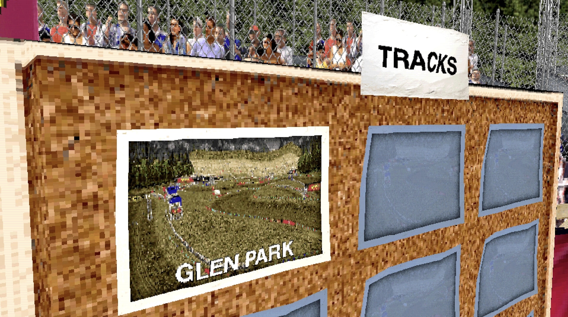DüRT: Track selection board showing Glen Park preview image beside blank panels at a fenced stadium wall.