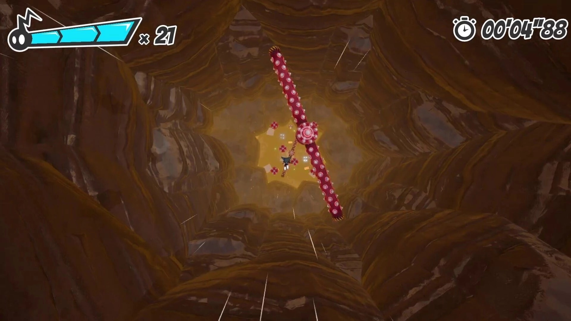 Ectorider: Top-down fall past a spinning red spiked bar in rocky shaft, timer and x21 HUD visible.