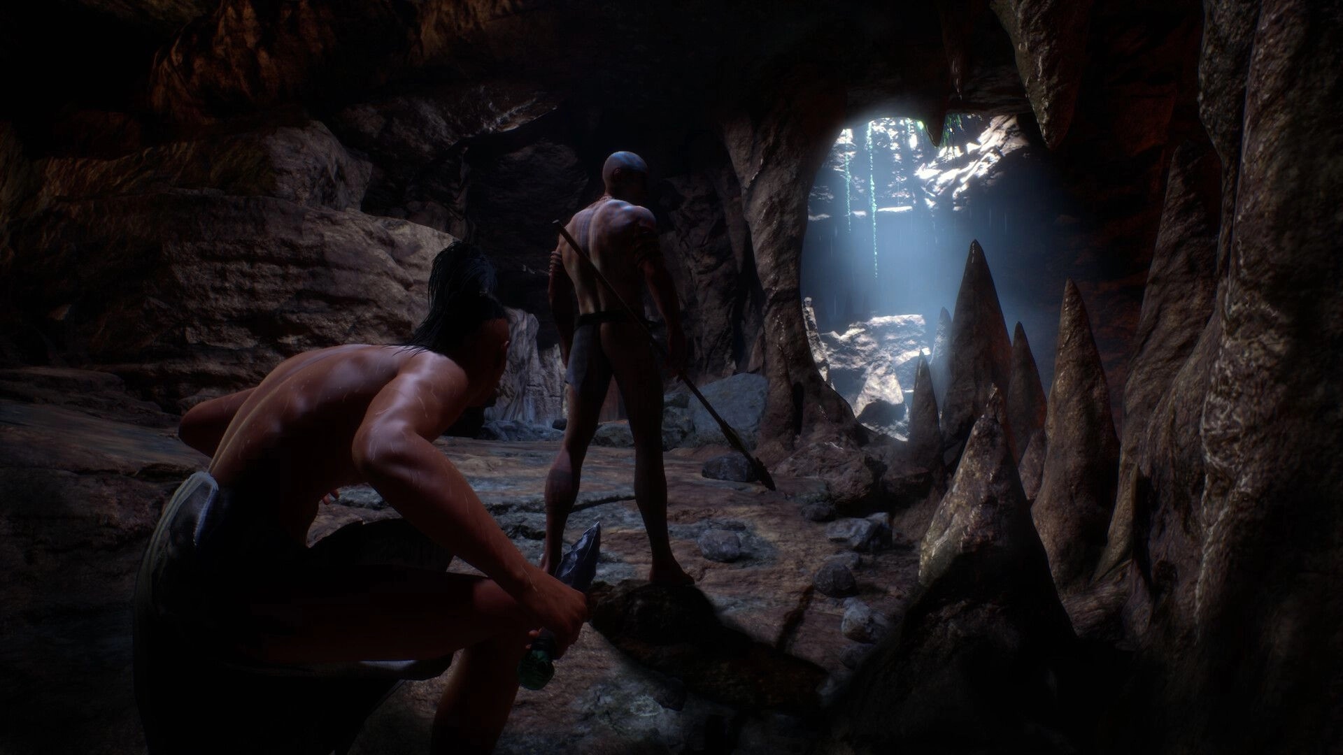 Ecumene Aztec: Two characters stealthily navigate a dimly lit cave with sharp rock formations.