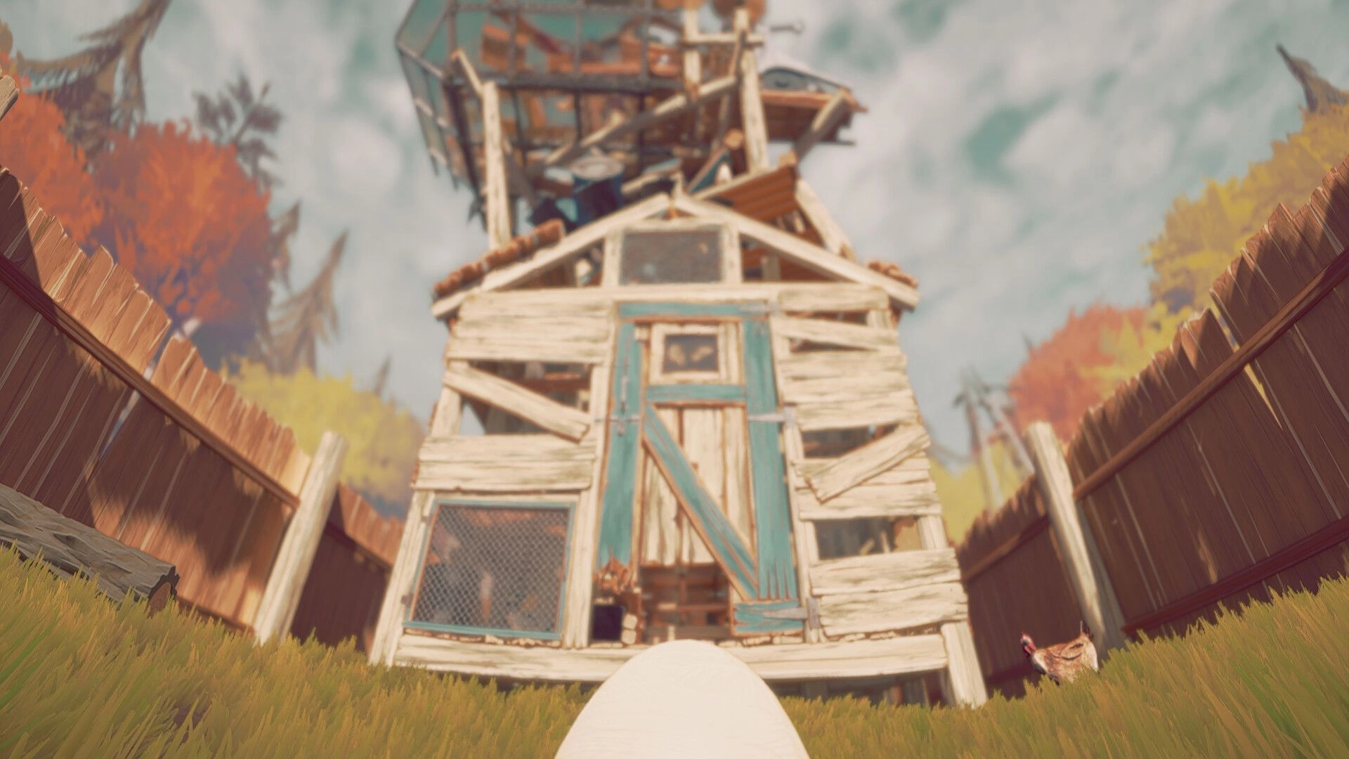 Egging On: Egg rolls towards a towering, dilapidated hen house surrounded by a wooden fence