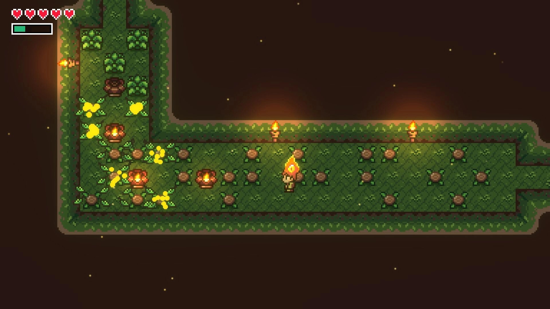 Elementallis: Character with fire magic explores a torch-lit dungeon corridor with green foliage