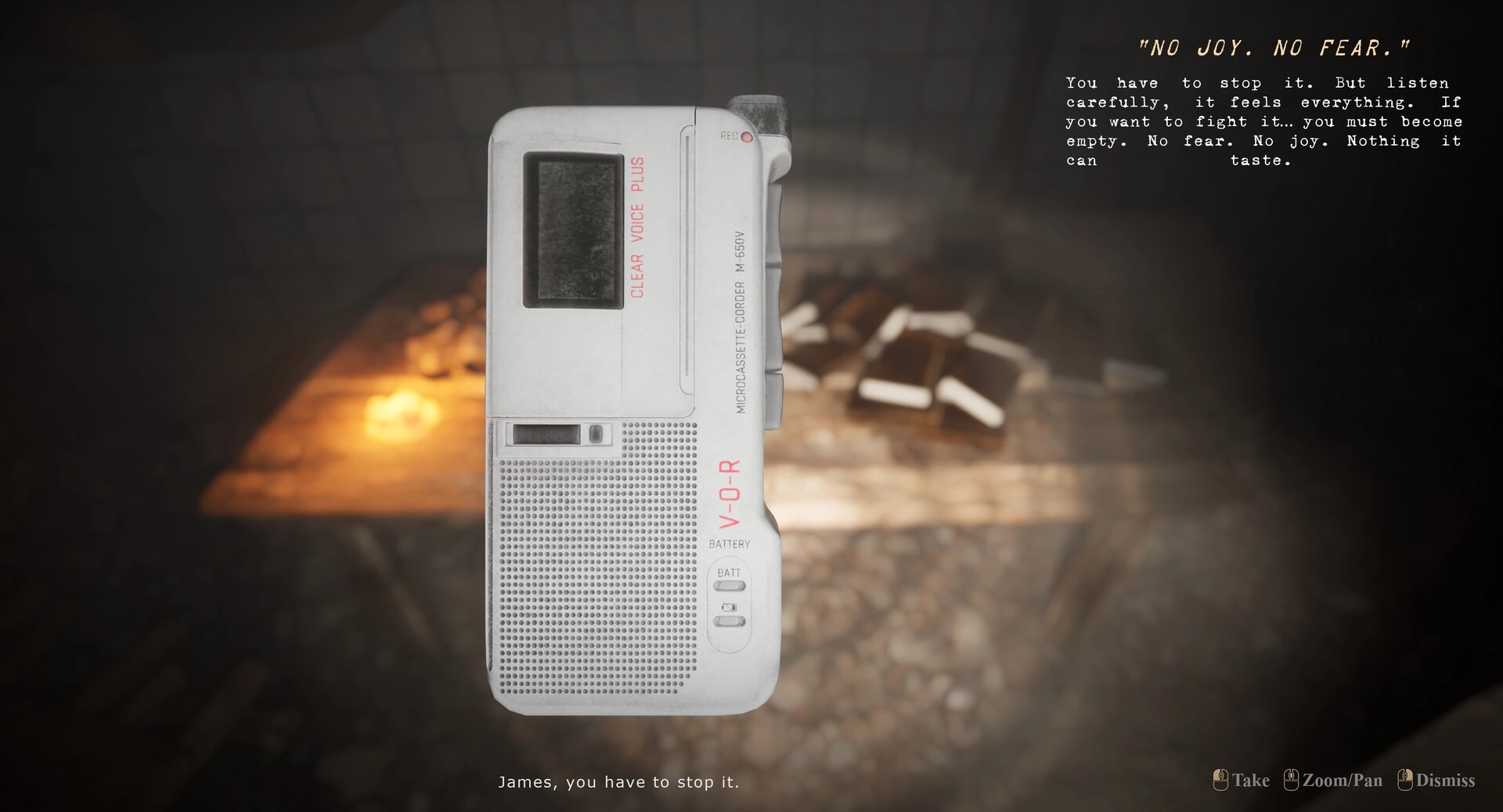 EMOTIONLESS: Handheld recorder with text overlay in dimly lit room with scattered papers
