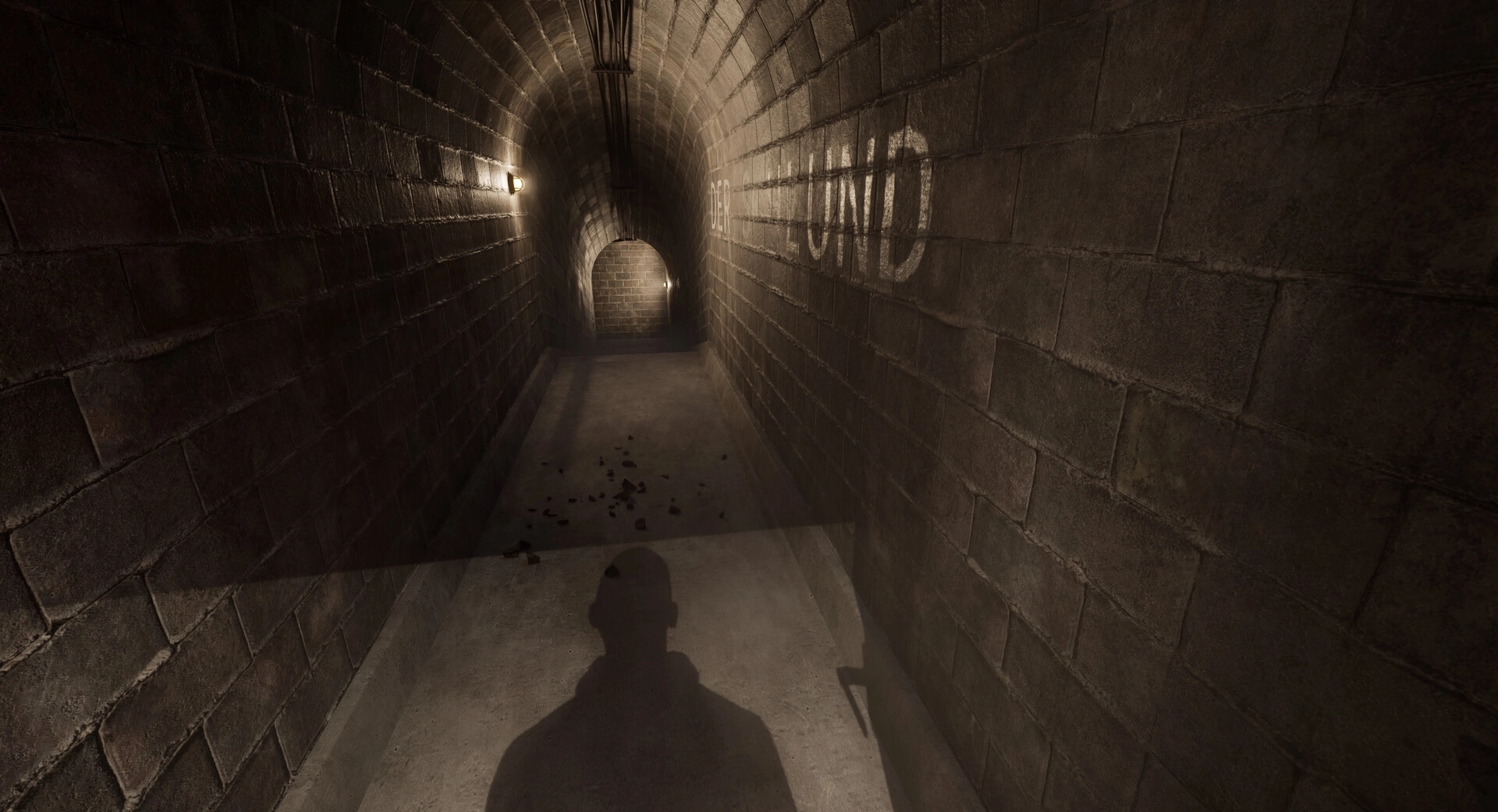 EMOTIONLESS: Shadow of a character in a dimly lit, narrow brick tunnel with scattered debris