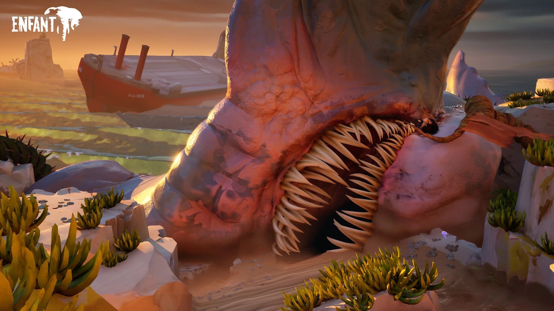 Enfant: Giant creature's mouth with sharp teeth in a rocky landscape near a stranded ship at sunset.