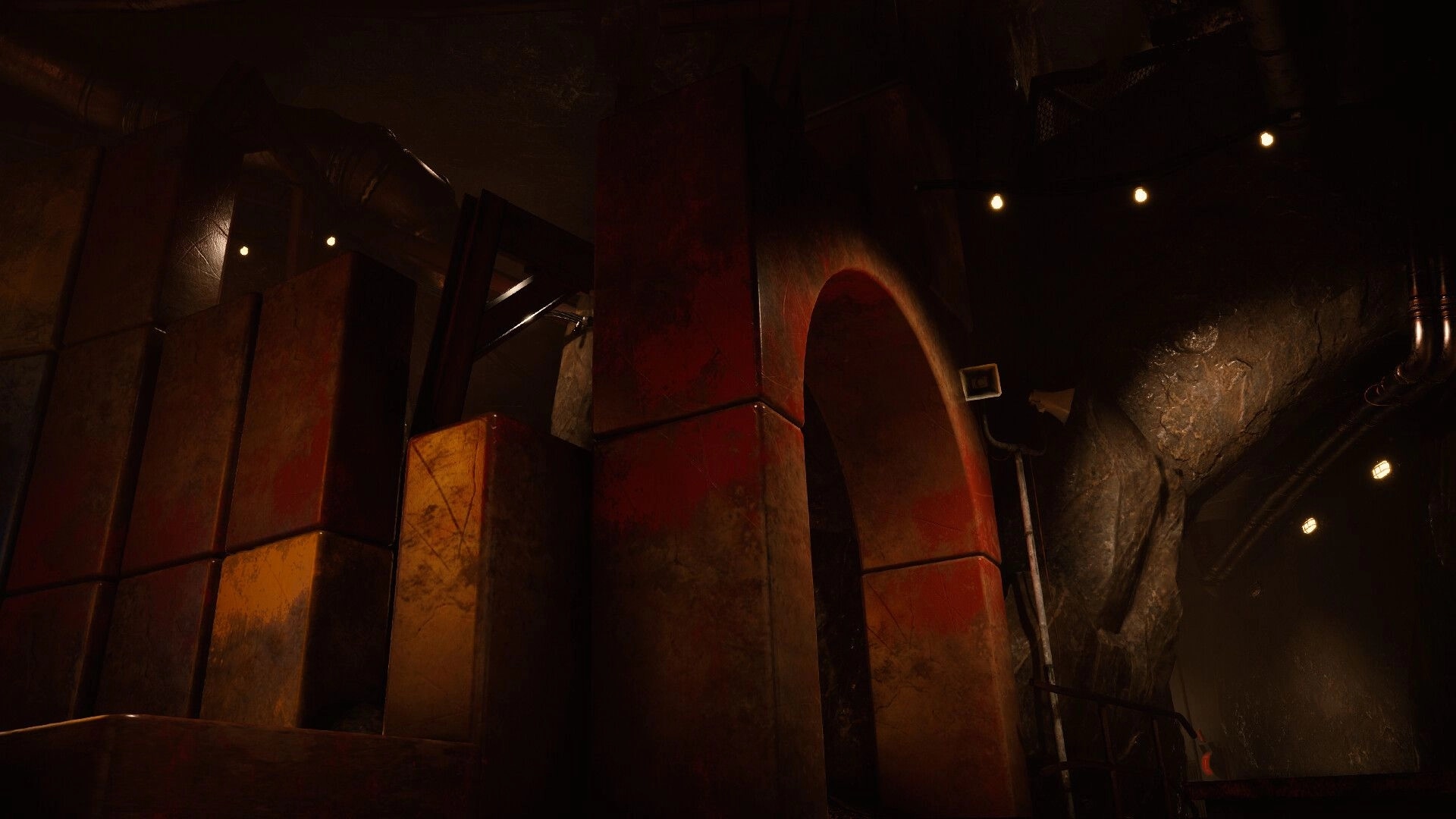 Escape from Playtime: Looking up at stacked toy blocks and a red archway in a dim factory tunnel.