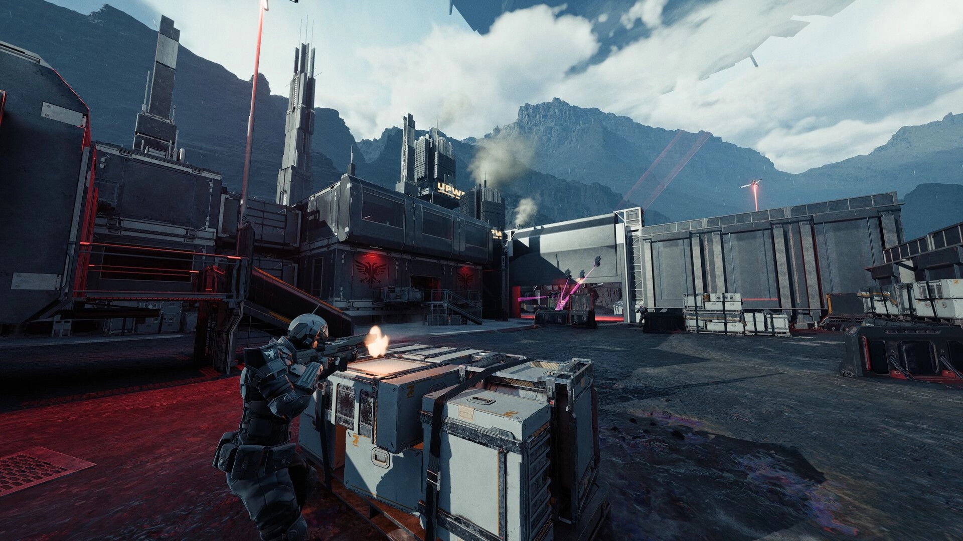 EVE Vanguard: Armored soldier firing from cover at a forward base courtyard with crates and mountains ahead.
