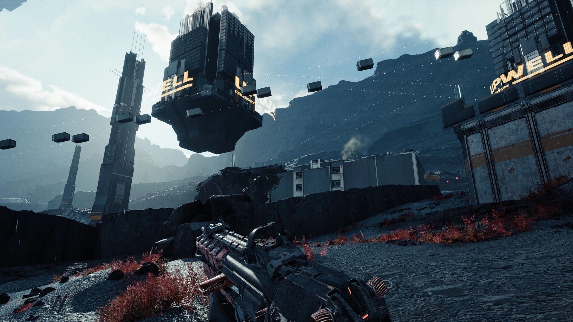 EVE Vanguard: First-person rifle view facing floating megastructures in a rocky industrial valley base.