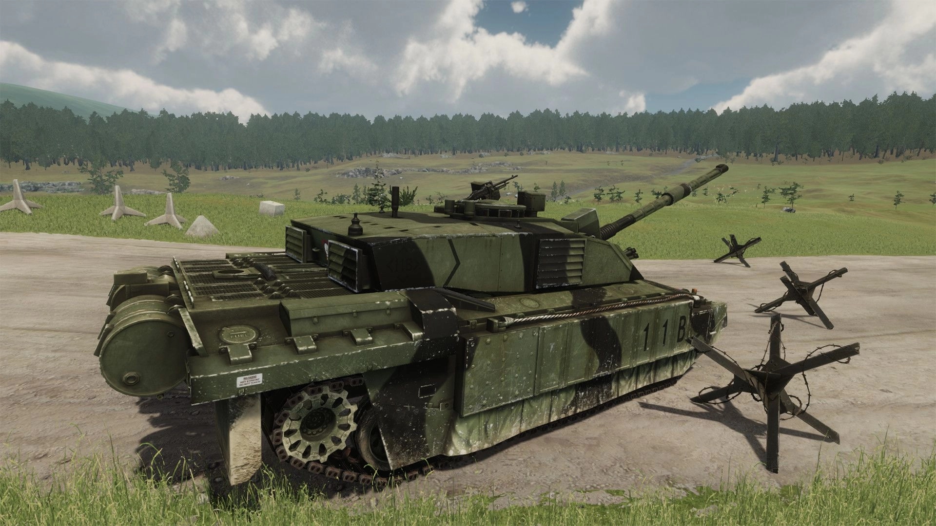 eXpanSIM: Military tank navigating a rural landscape with defensive obstacles in open countryside