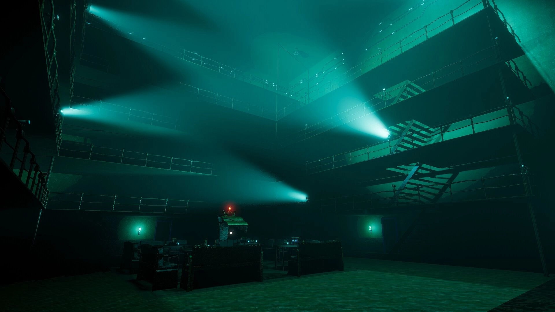 Expendabots: Searchlights sweep a multi-level industrial atrium with catwalks and stairways in fog.