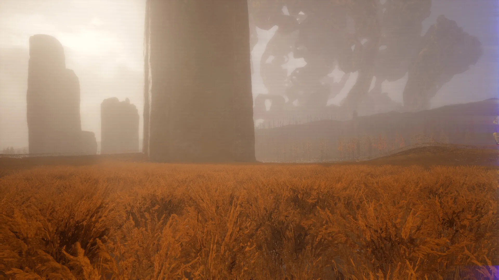 EXPLOITATION: Vast alien landscape with towering rock formations and dense orange foliage in misty atmosphere