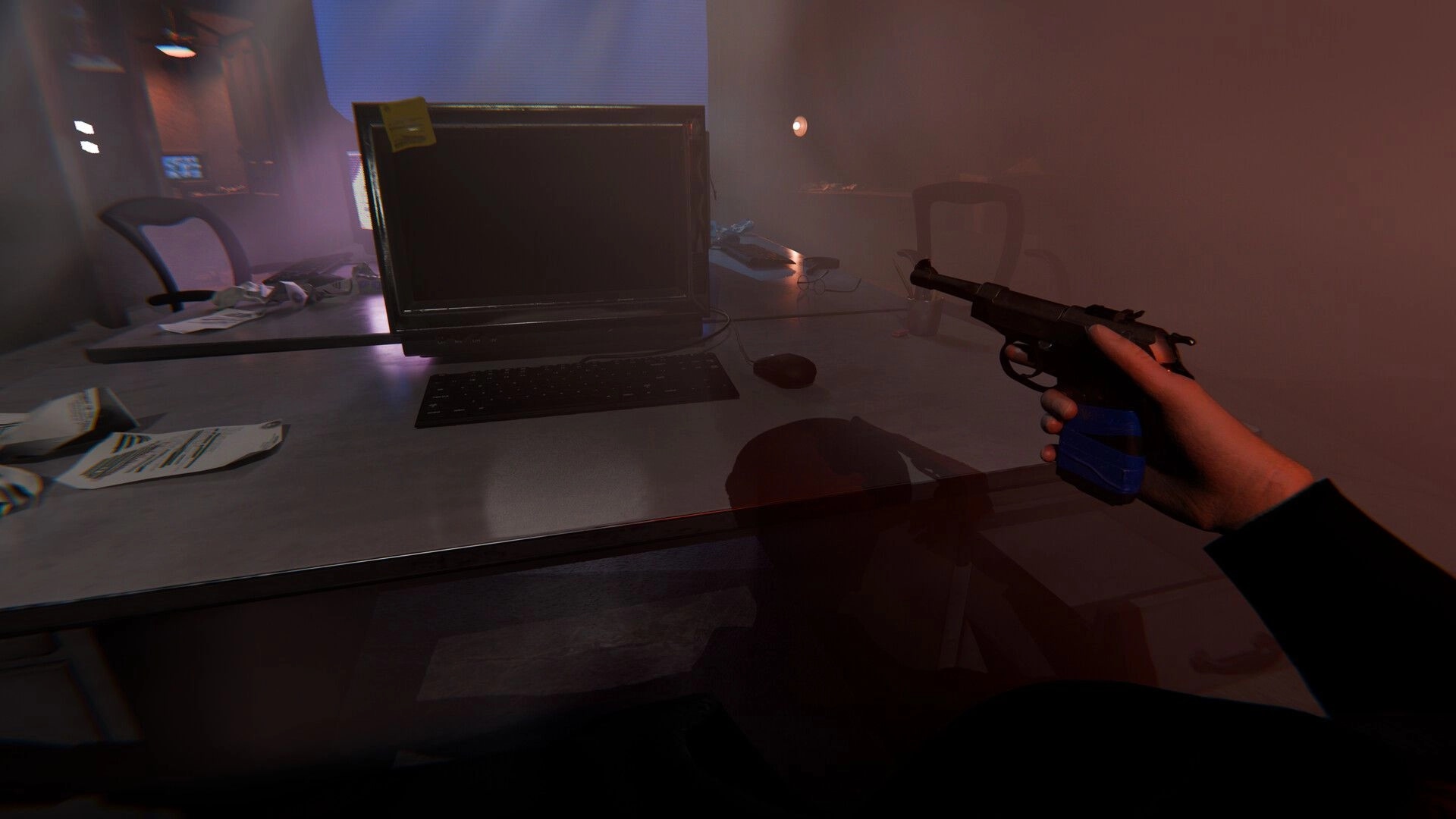 Eyes Wide Open: First-person view aiming a pistol at a dark monitor on a cluttered office desk.