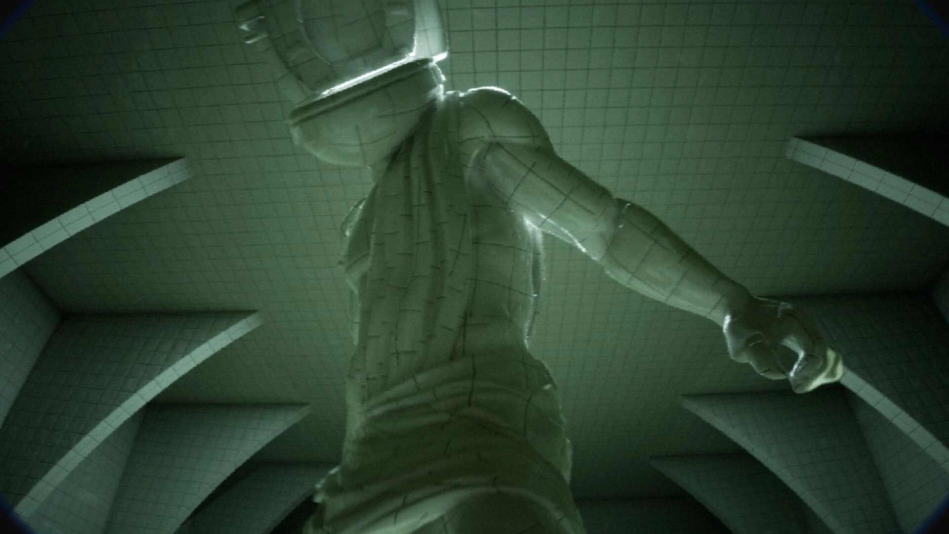 FailRooms: Looking up at a huge tiled statue holding a sword in a dim green tiled chamber.