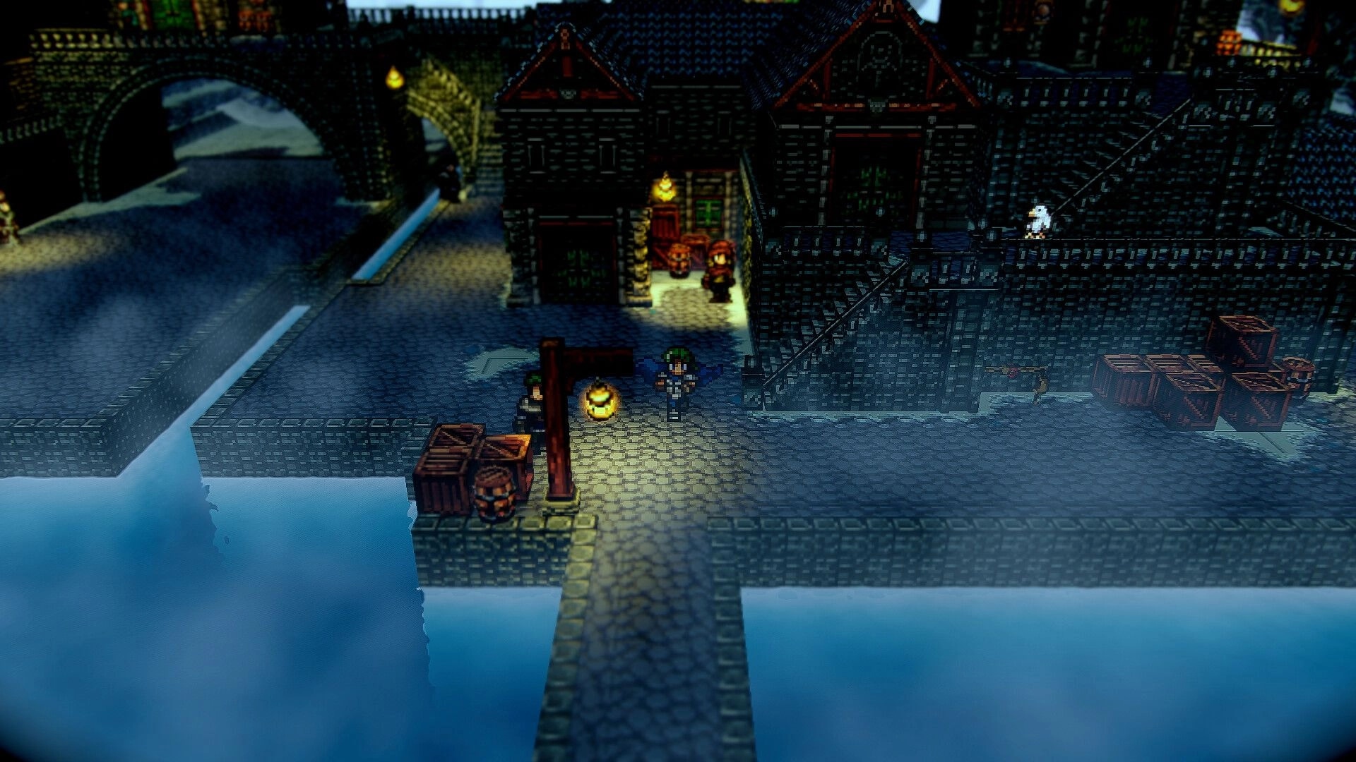 Fallen Symphony: Player walks past crates and lanterns on a stone dock by dark town buildings at night.