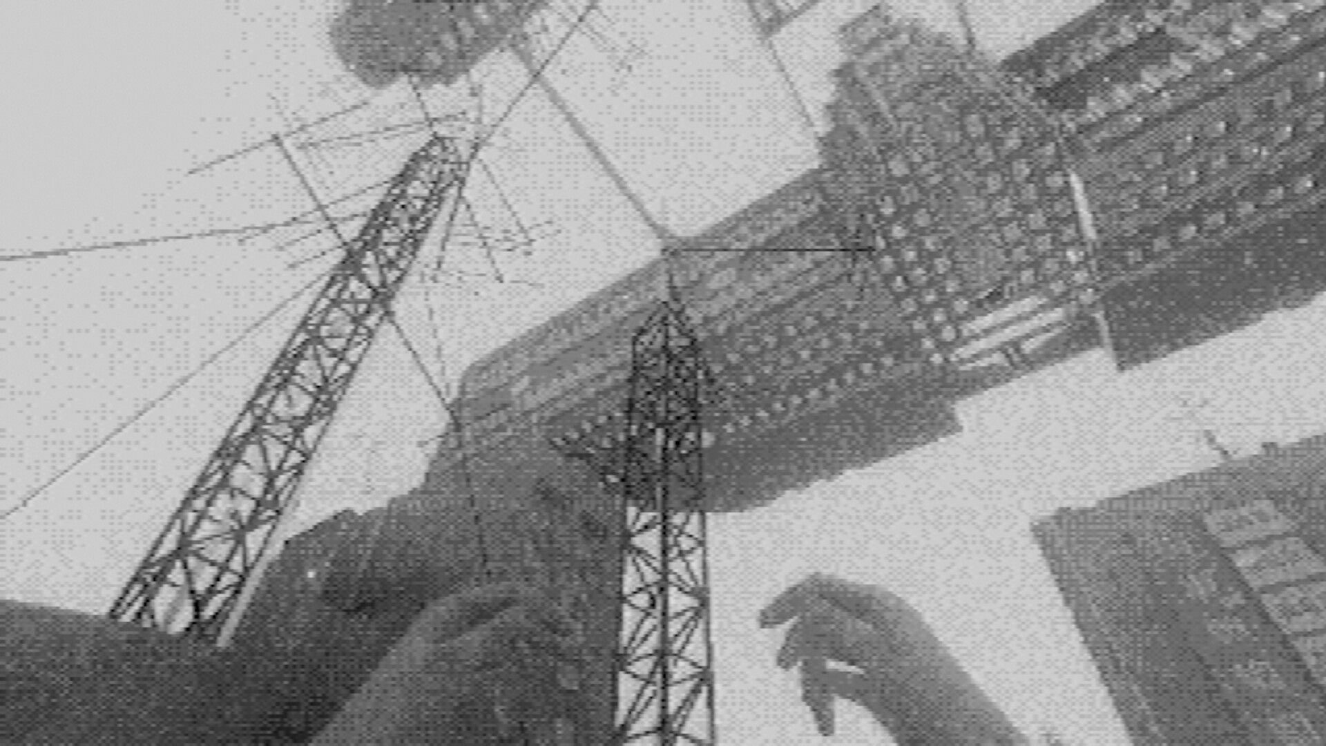 Fallgrade: First-person view looking up at towering pylons and concrete blocks in grainy voidscape.