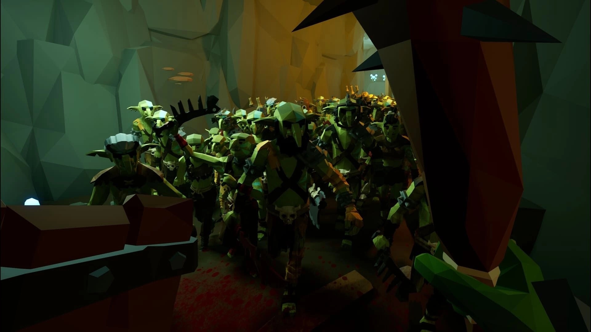 Fangstorm: First-person view facing a packed goblin horde in a narrow cave corridor, weapon raised.