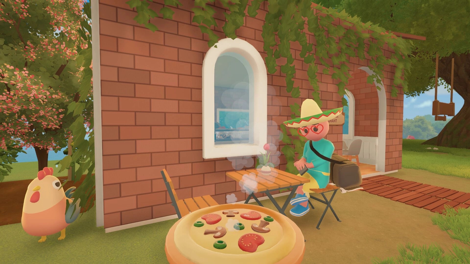 Farm to Table: Chef in a sombrero sits outside restaurant with steaming pizza and a chicken nearby