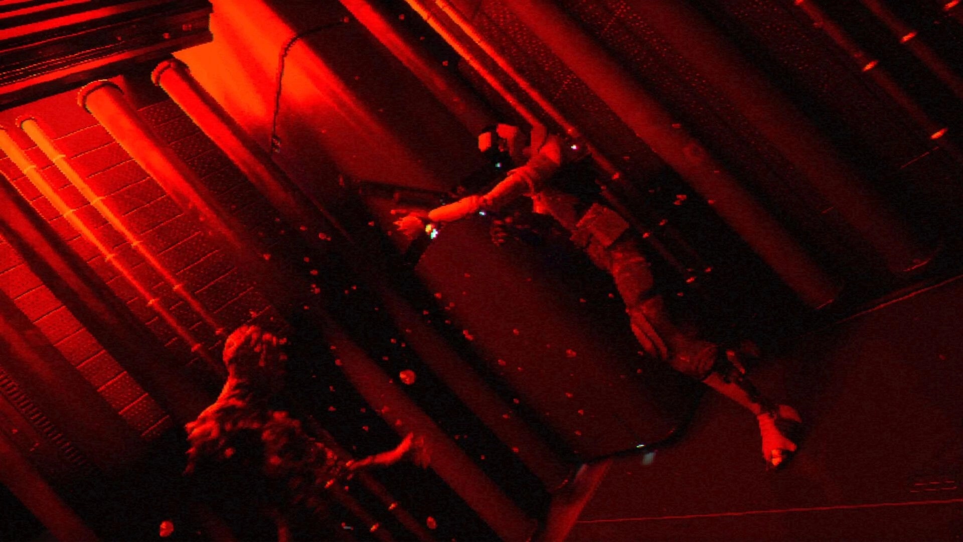 FEAR OF SLEEP: Suited figure drifts in zero gravity near pipes and debris in red-lit corridor