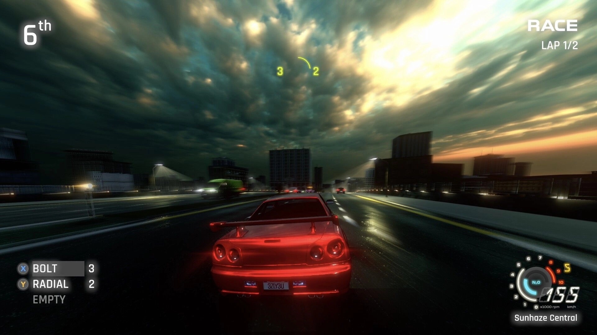 FENDERSHOT: Red car racing in 6th place on wet city highway at sunset, lap 1/2 HUD visible.