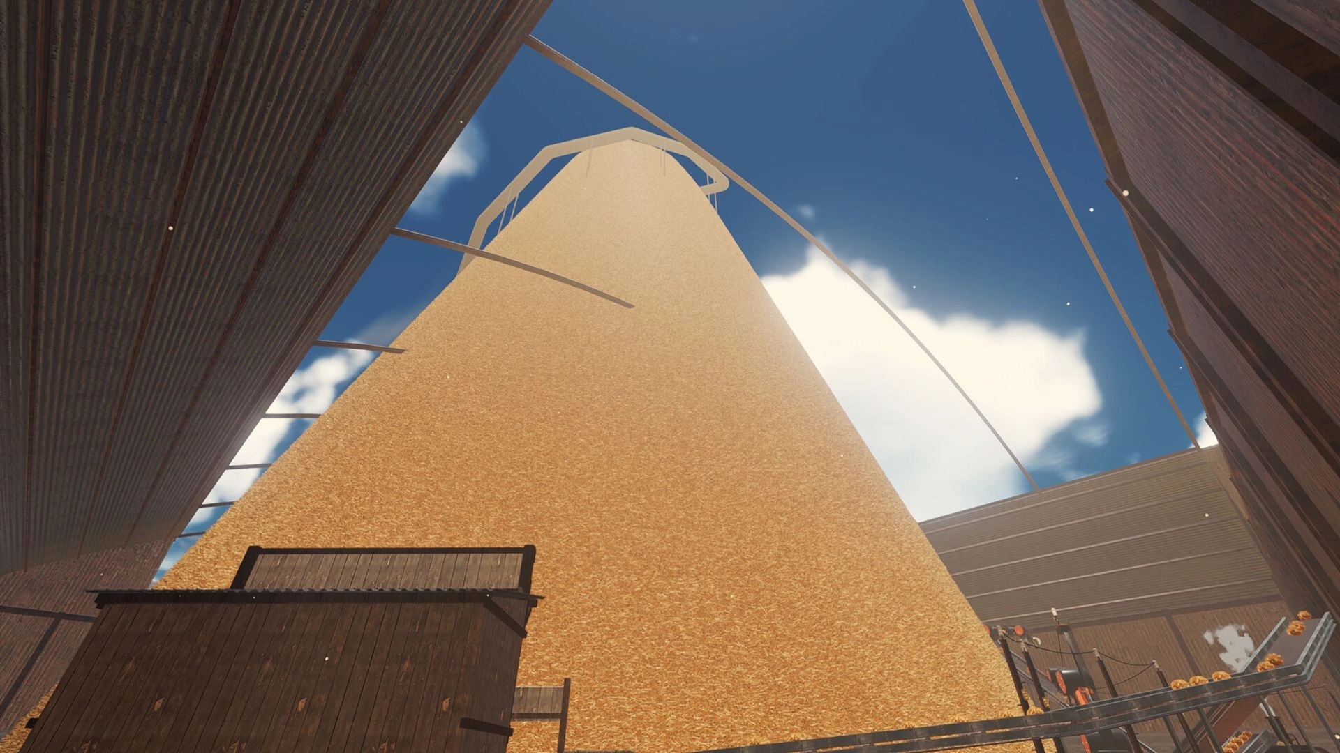 Find The Needle: Towering haystack pile in open barn yard with conveyor belts and wooden walls overhead.