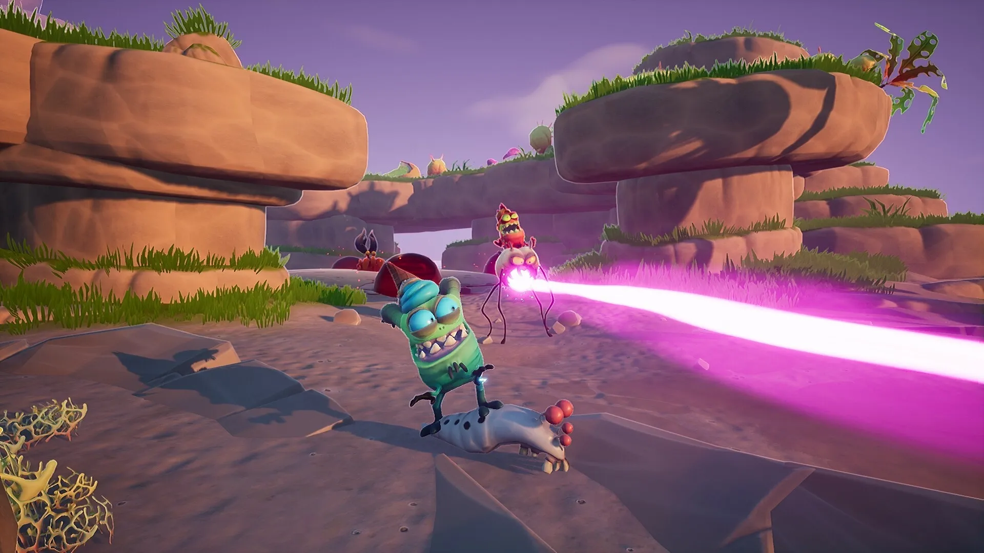 Flea Madness: Alien flea firing pink laser attack in rocky outdoor arena during multiplayer battle.