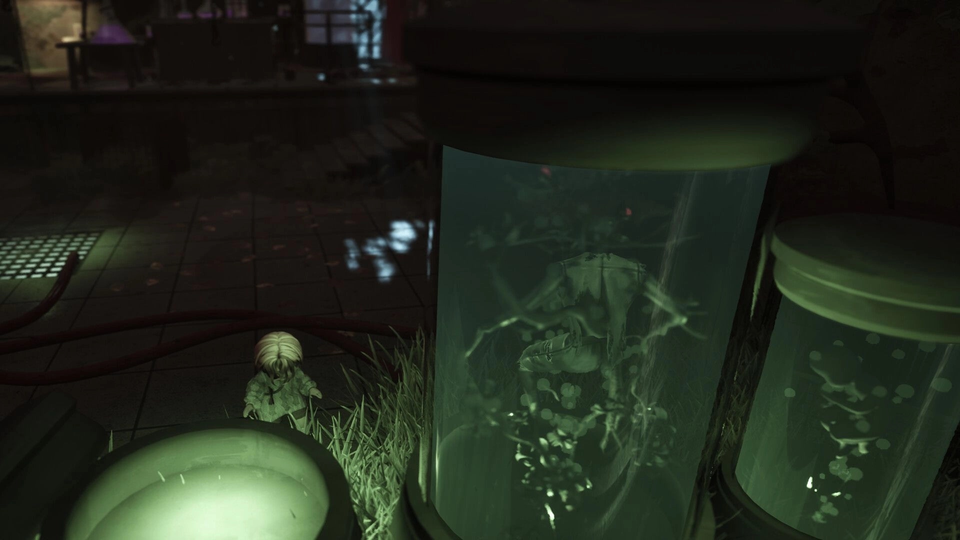 Floralis: Small character observes glowing tanks with organic figures in a dim, industrial lab setting.
