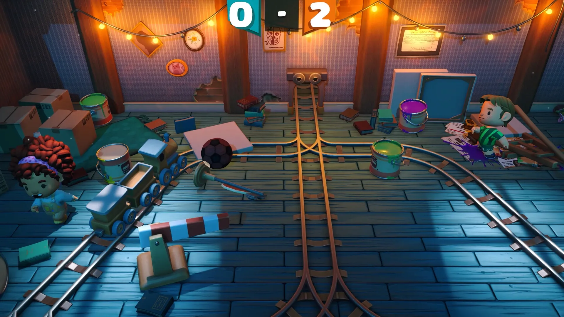 Footsy: Two characters in a cluttered room with toy train tracks and paint cans, score 0-2 displayed