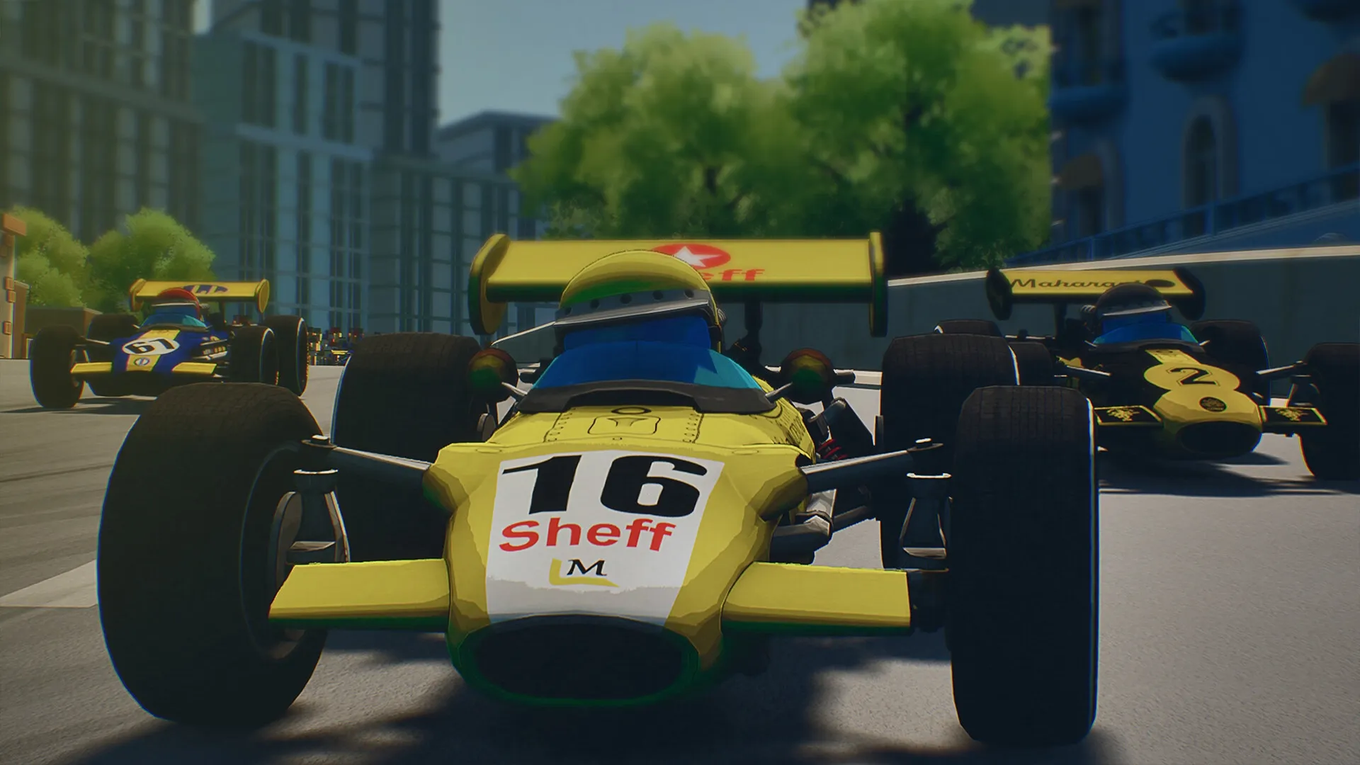 Formula Legends: Vintage race cars speed through a city circuit with trees and buildings in the background