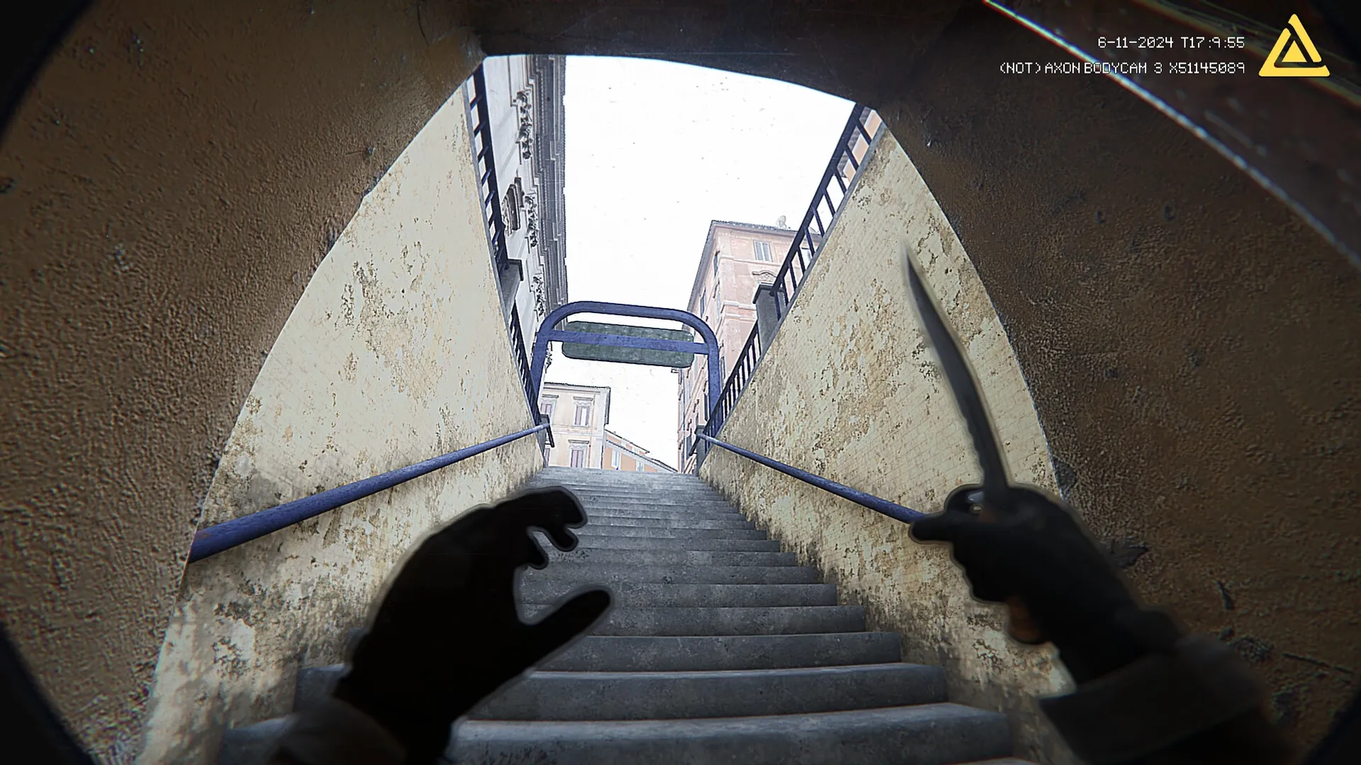 Fractured Mind: Player holding knife ascending urban stone staircase with bodycam interface visible