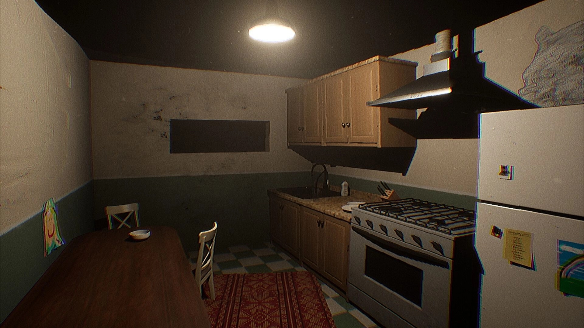 From Devil's Womb: Dimly lit, eerie kitchen with empty chairs, a table, and worn-out cabinets