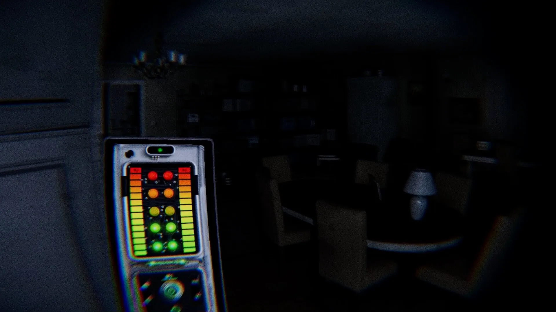 Ghost Frequency: EMF Ghost Detector active in dimly lit dining room with round table and chairs visible
